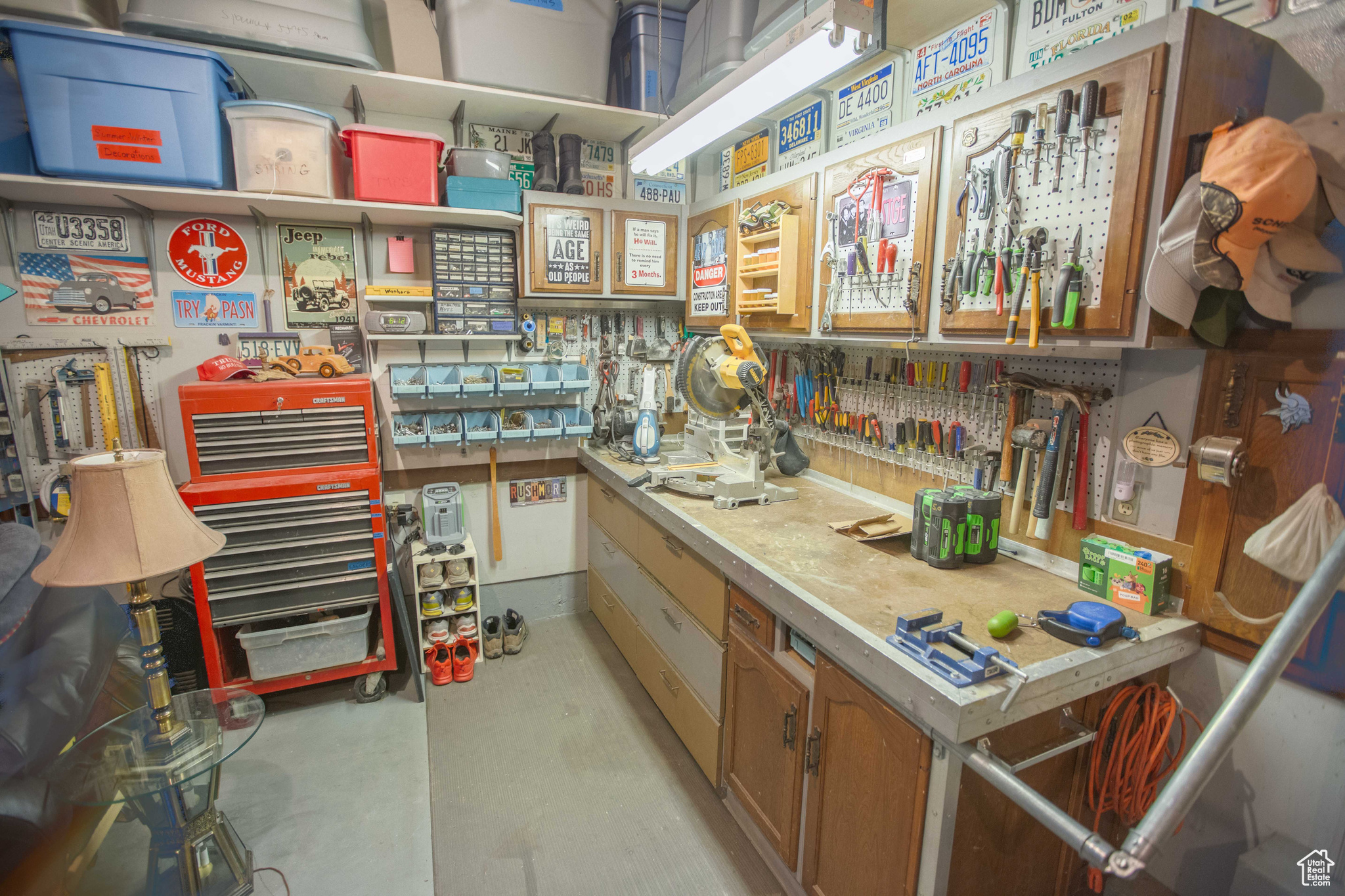 Spacious garage with work bench.