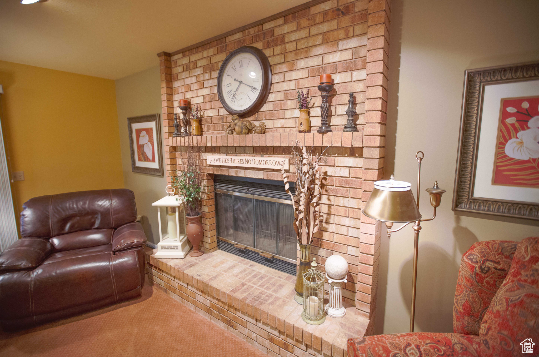 Family room with wood-burning fireplace.