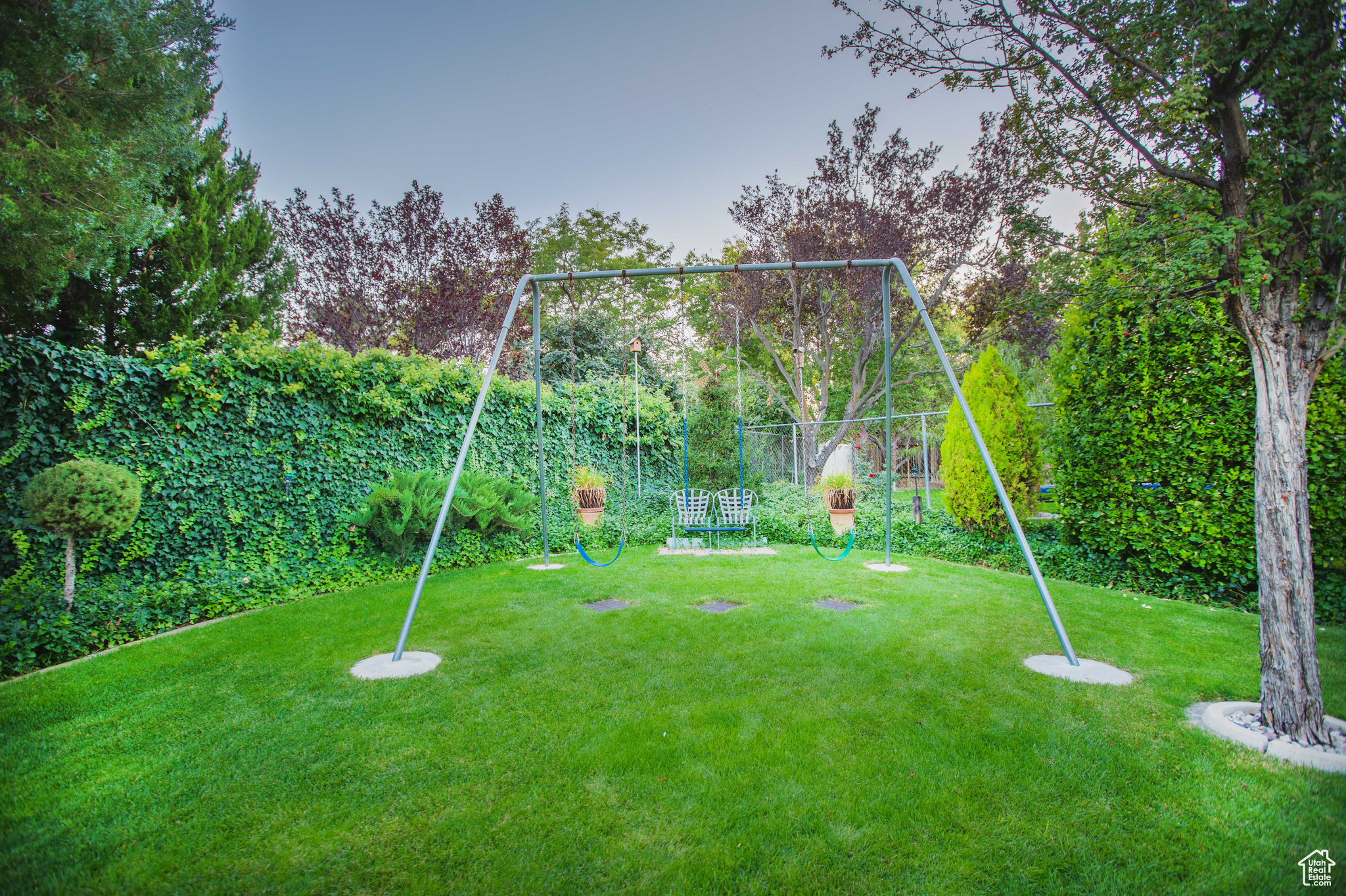 Park-grade swing set (in ground cemented).