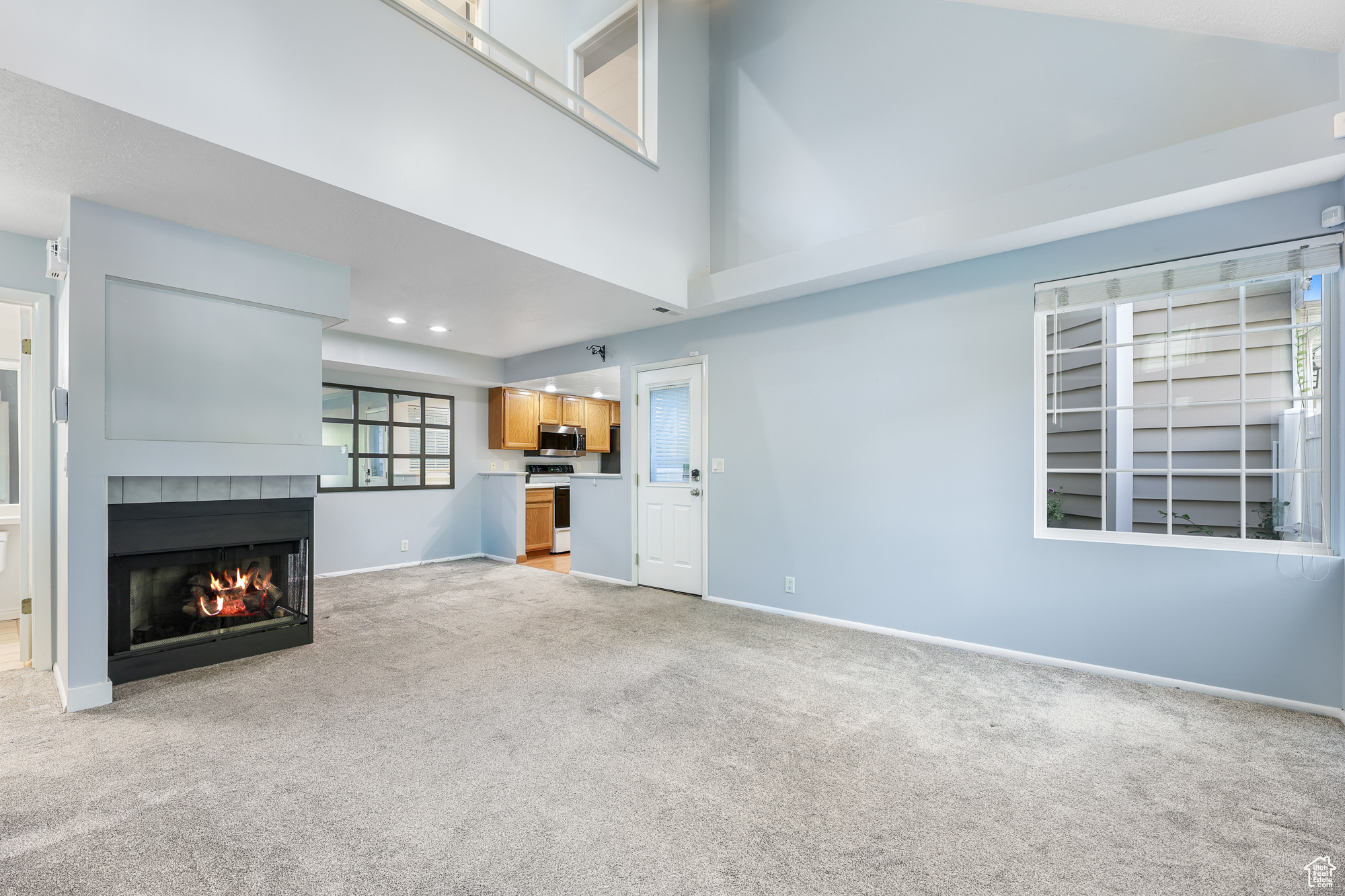 Fireplace and dining area next to the kitchen