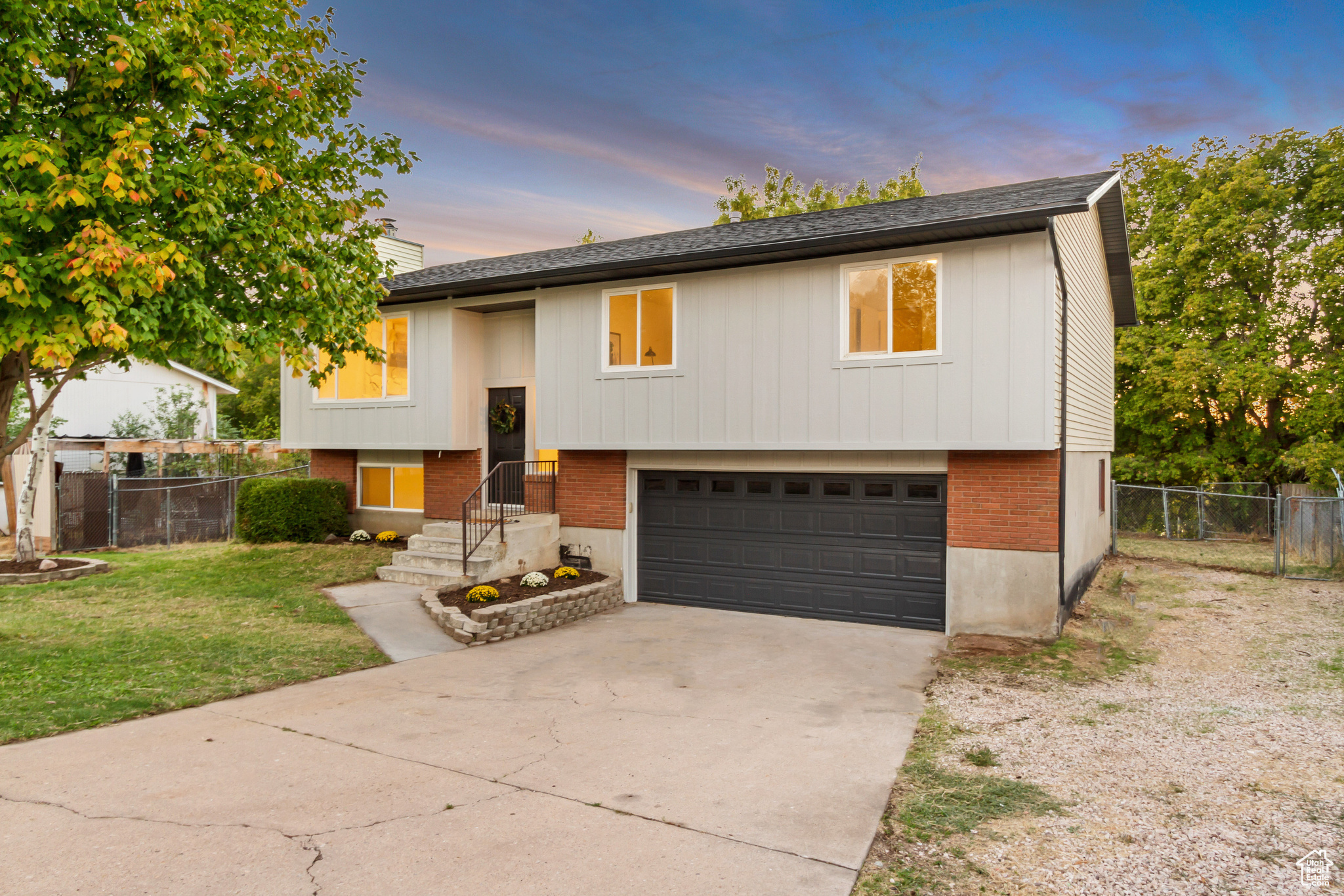 Raised ranch featuring a garage