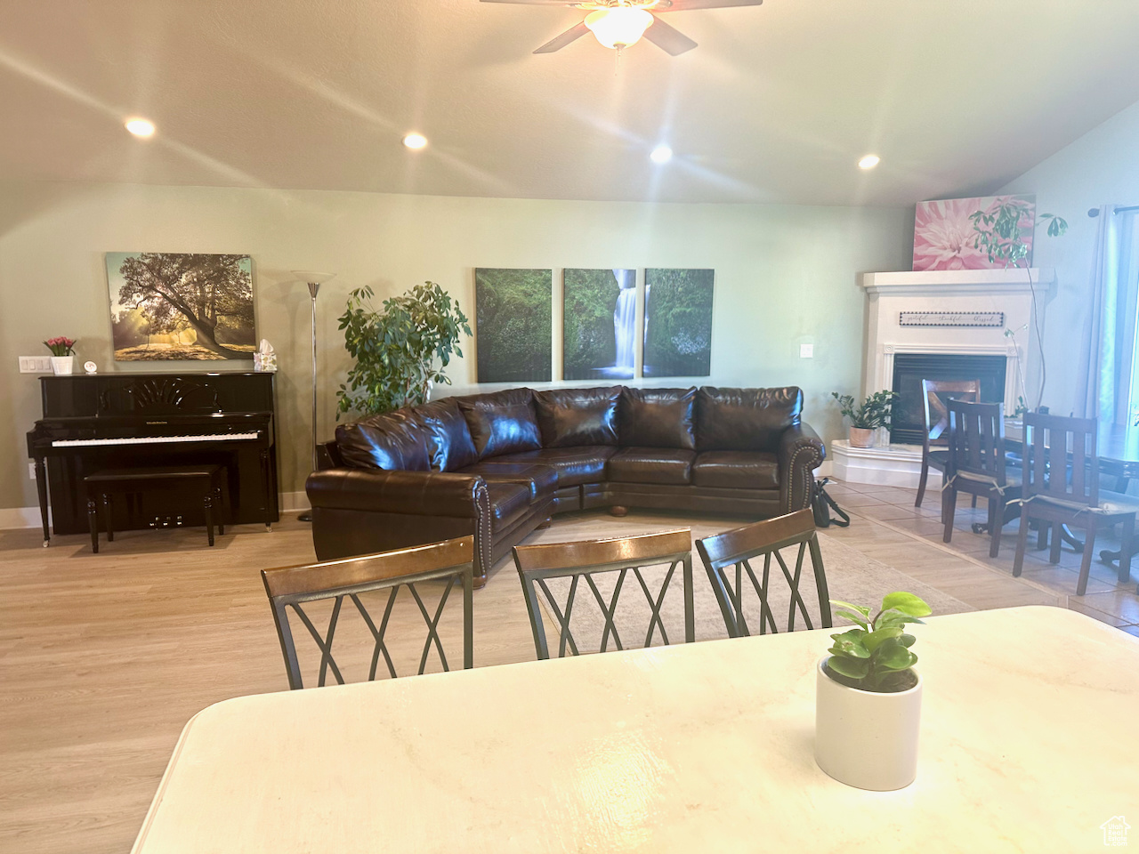 Interior space with light wood-type flooring and ceiling fan