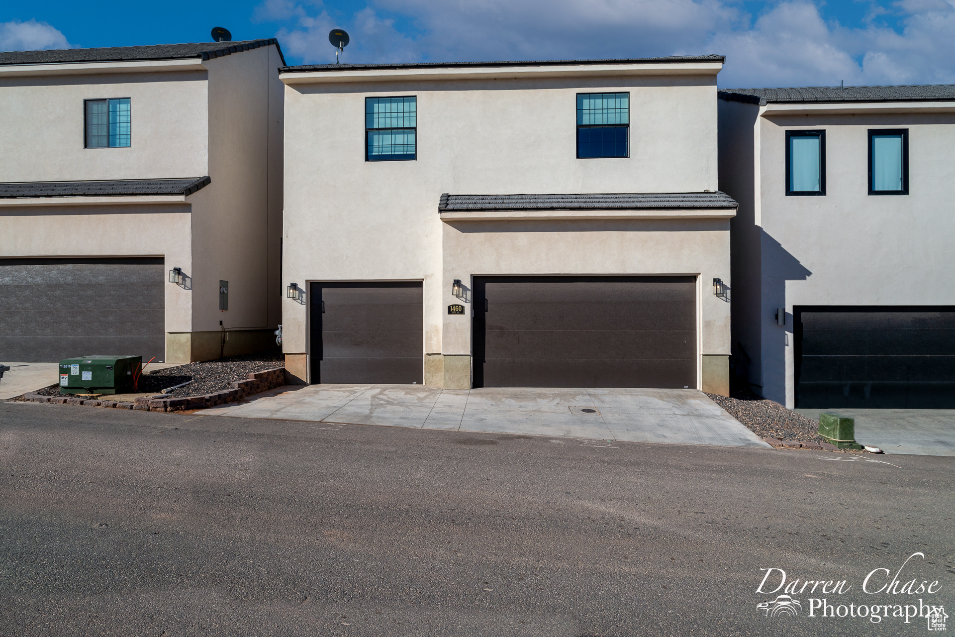 View of front of property featuring a garage