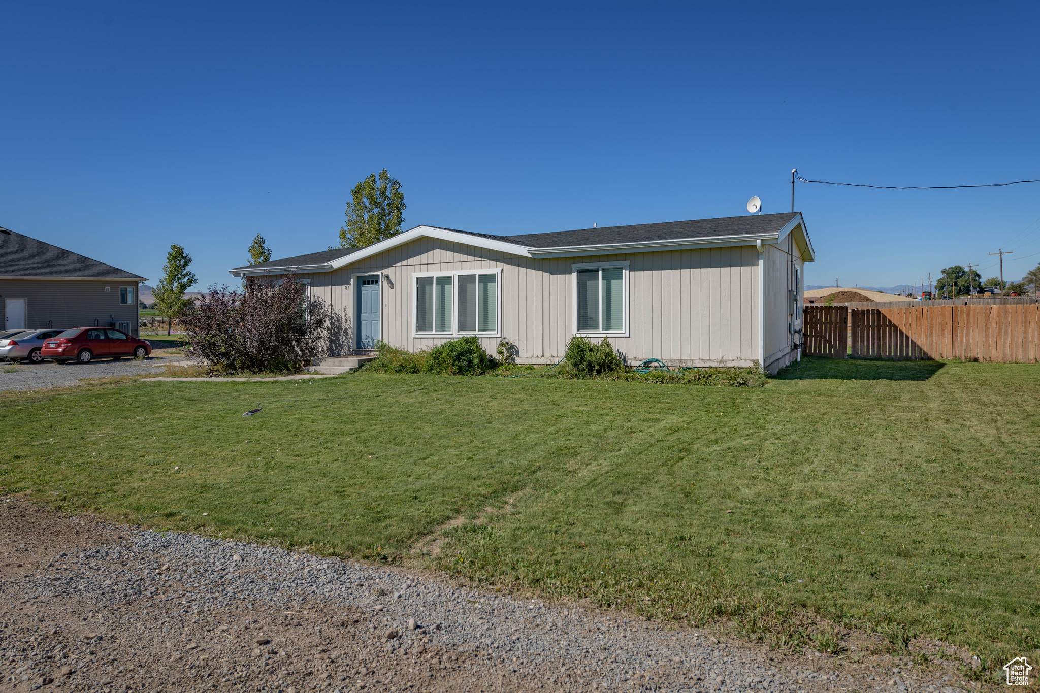 View of front of property featuring a front yard