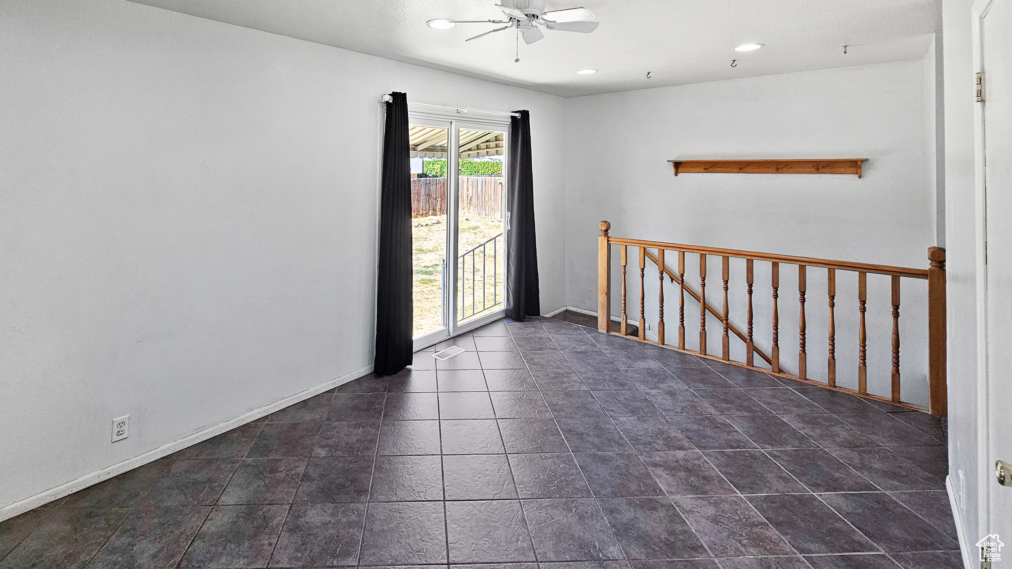 Empty room with ceiling fan