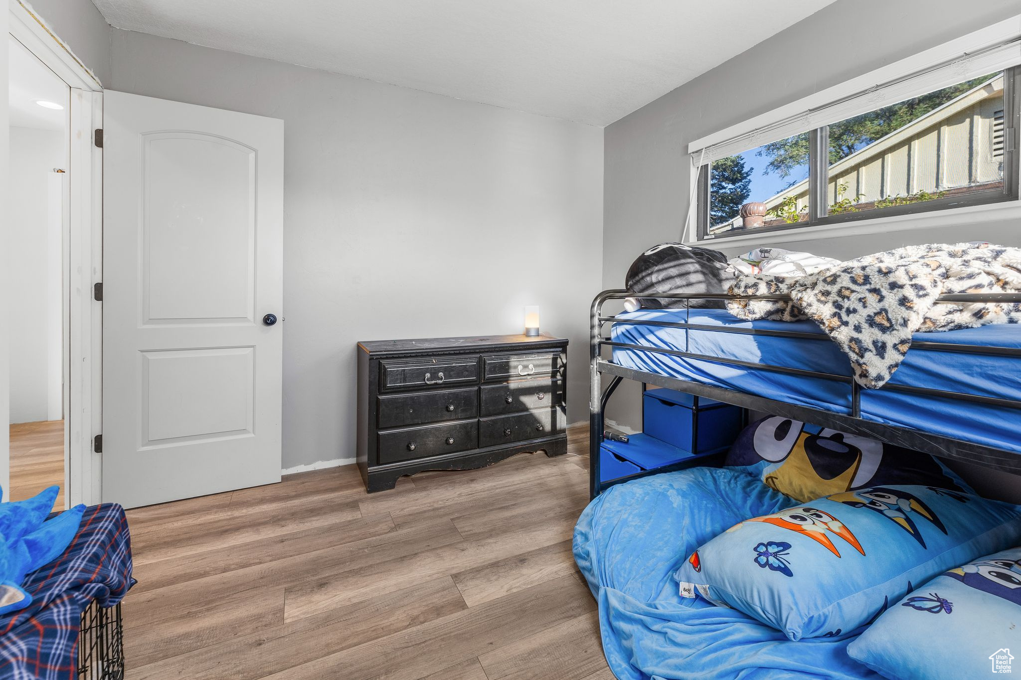 Bedroom featuring wood-type flooring