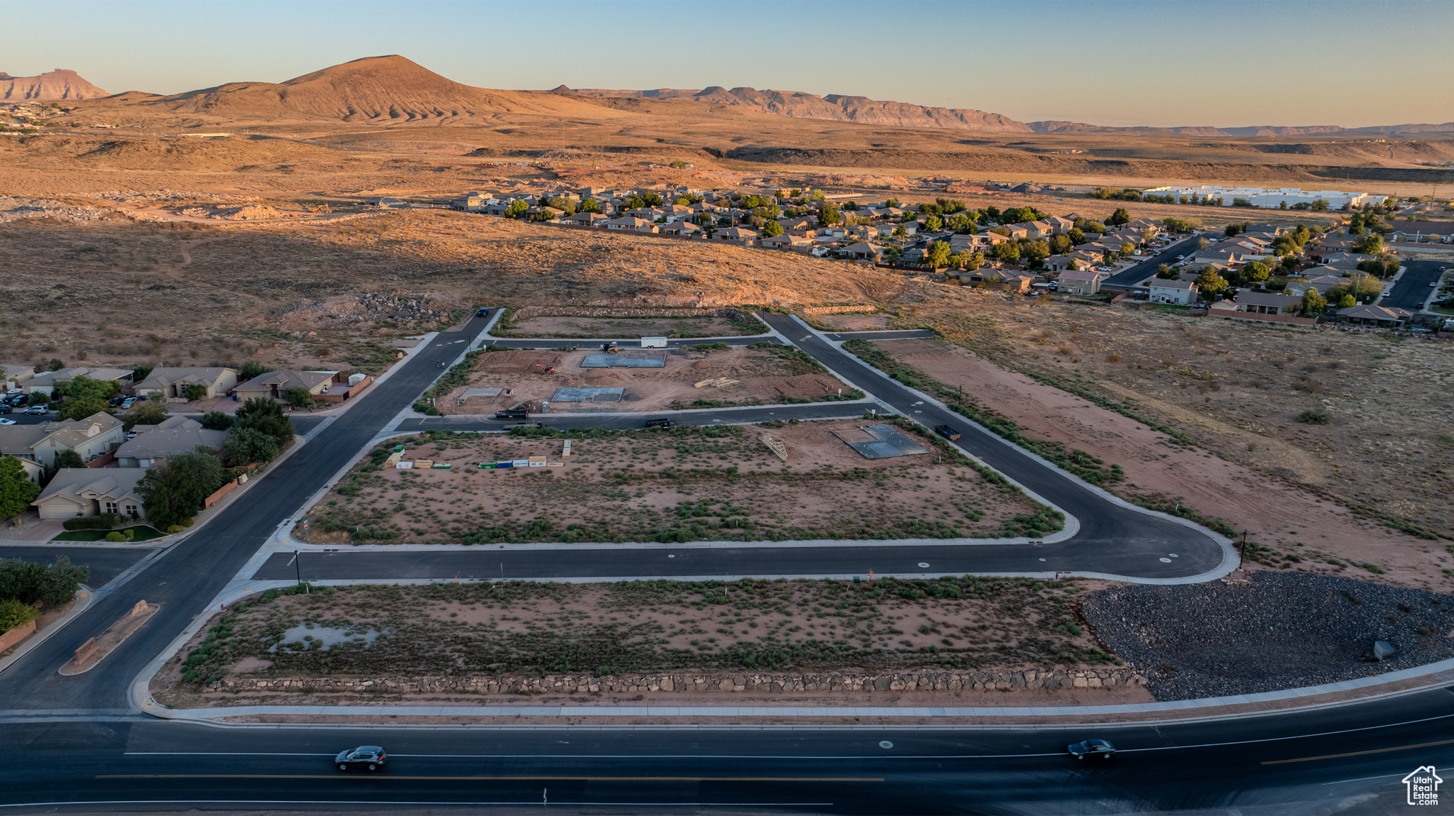 Aerial view at dusk featuring a mountain view