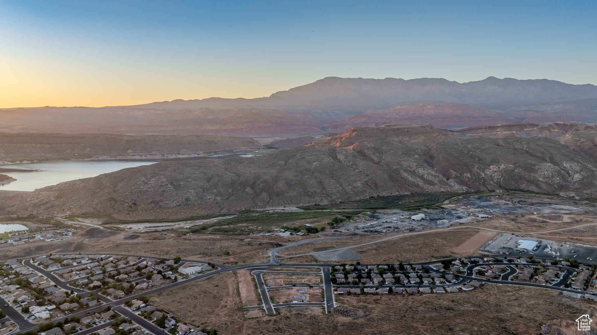 Property view of mountains with a water view