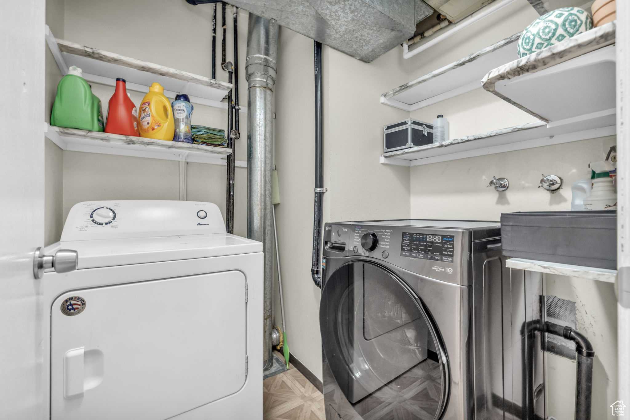 Laundry room featuring washing machine and dryer