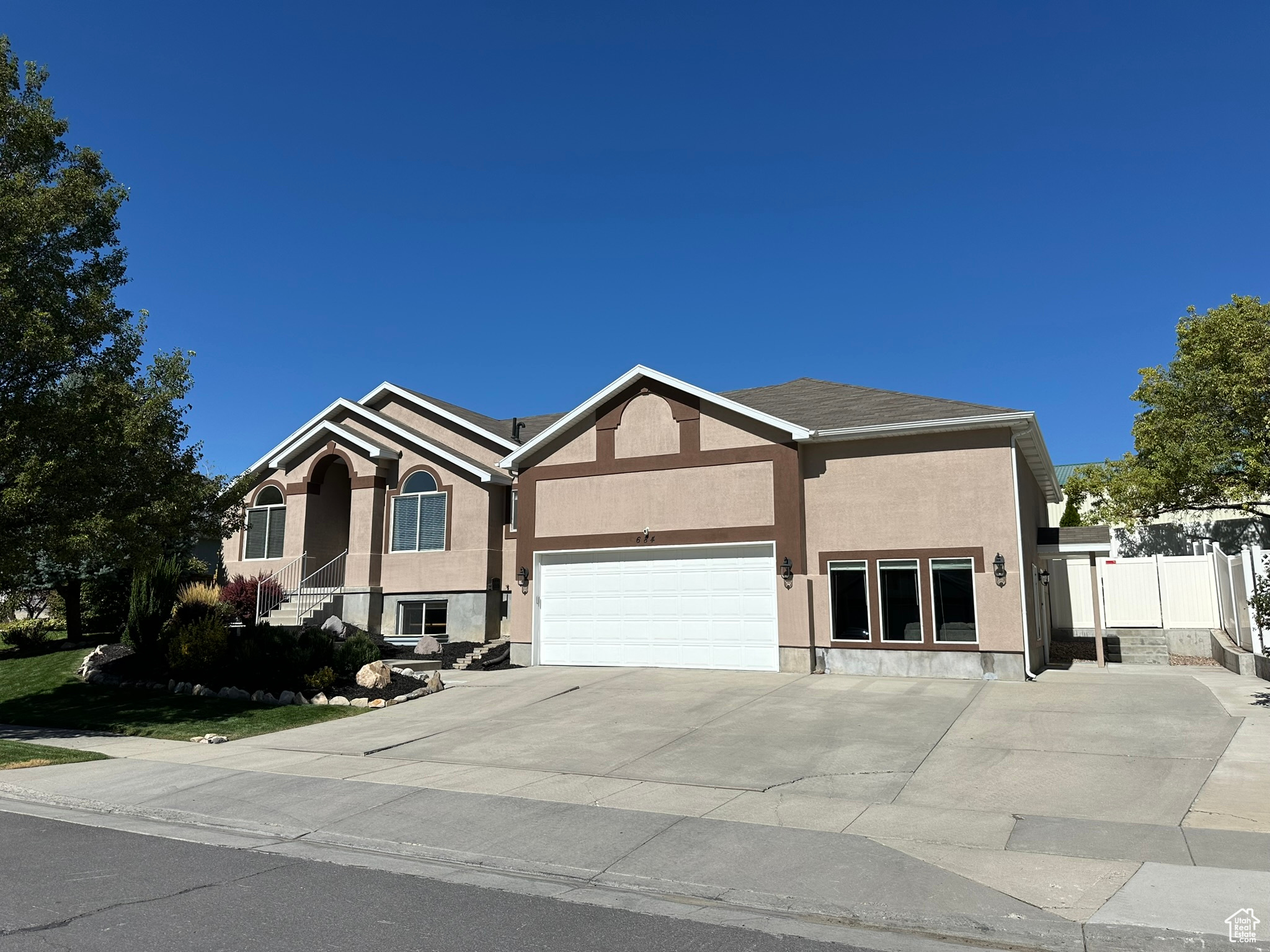 View of front of property with a garage