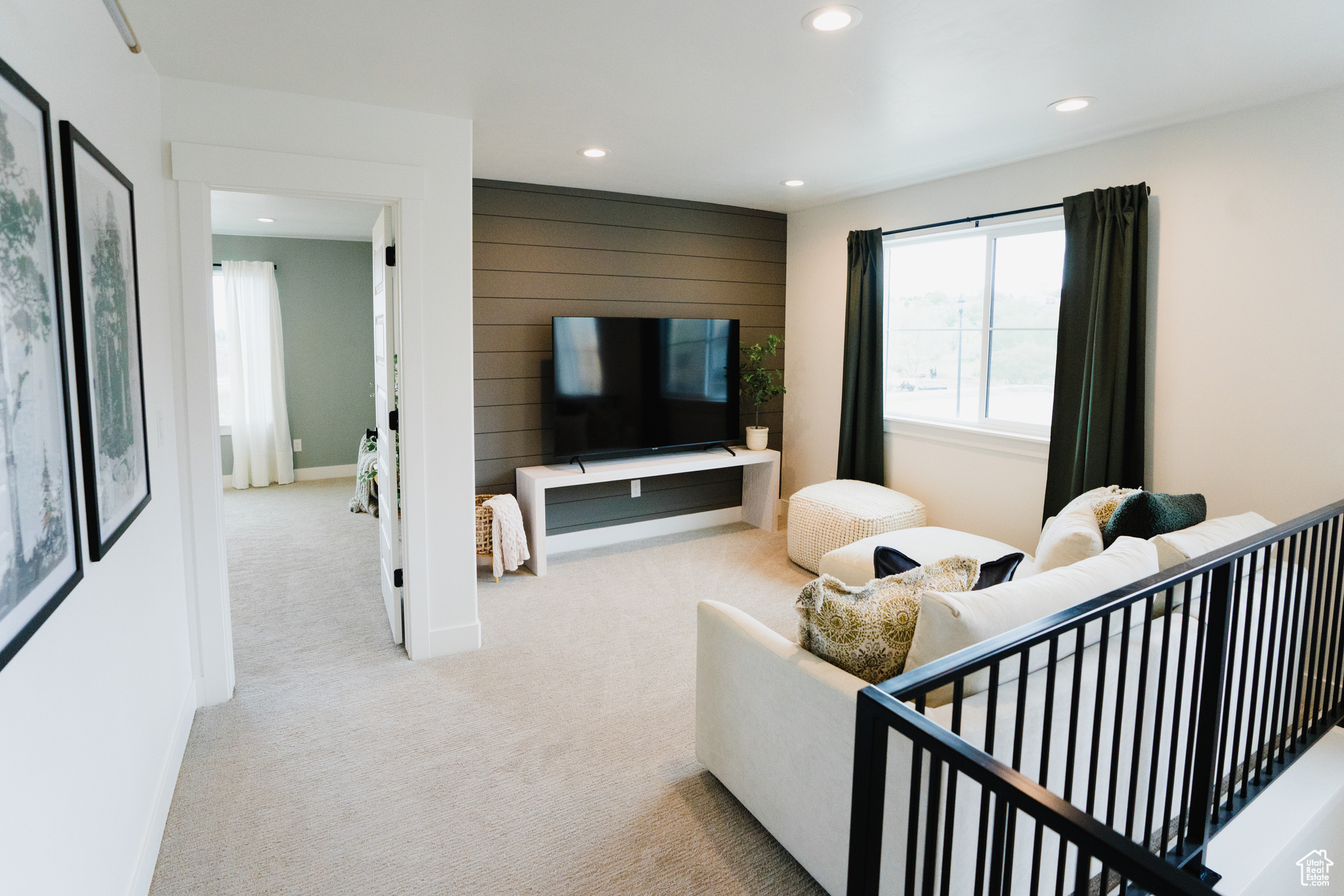 Living room featuring light colored carpet