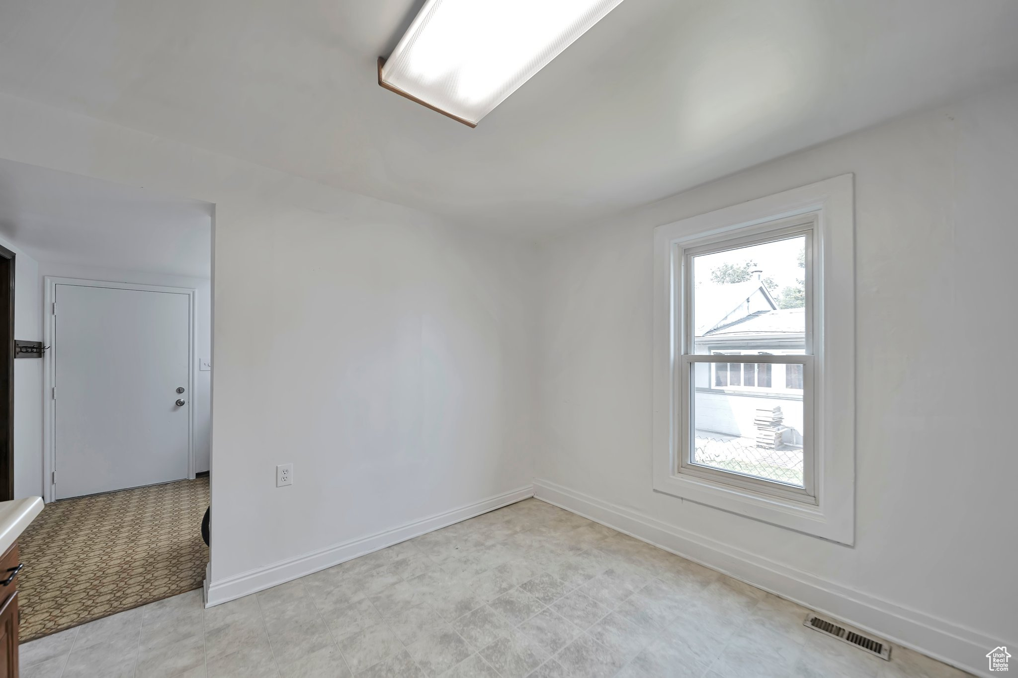 Kitchen dining area also has a formal dining room.