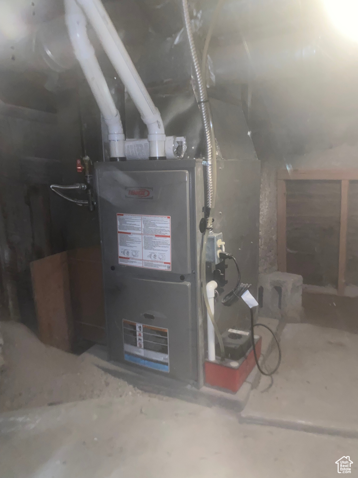 Upgraded high efficiency furnace in basement crawl space.