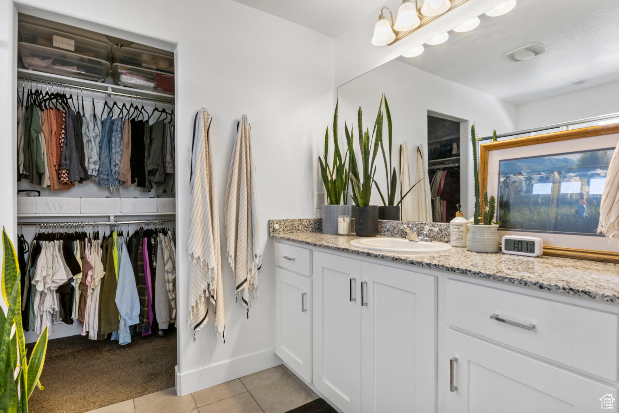 Bathroom featuring vanity and tile patterned floors