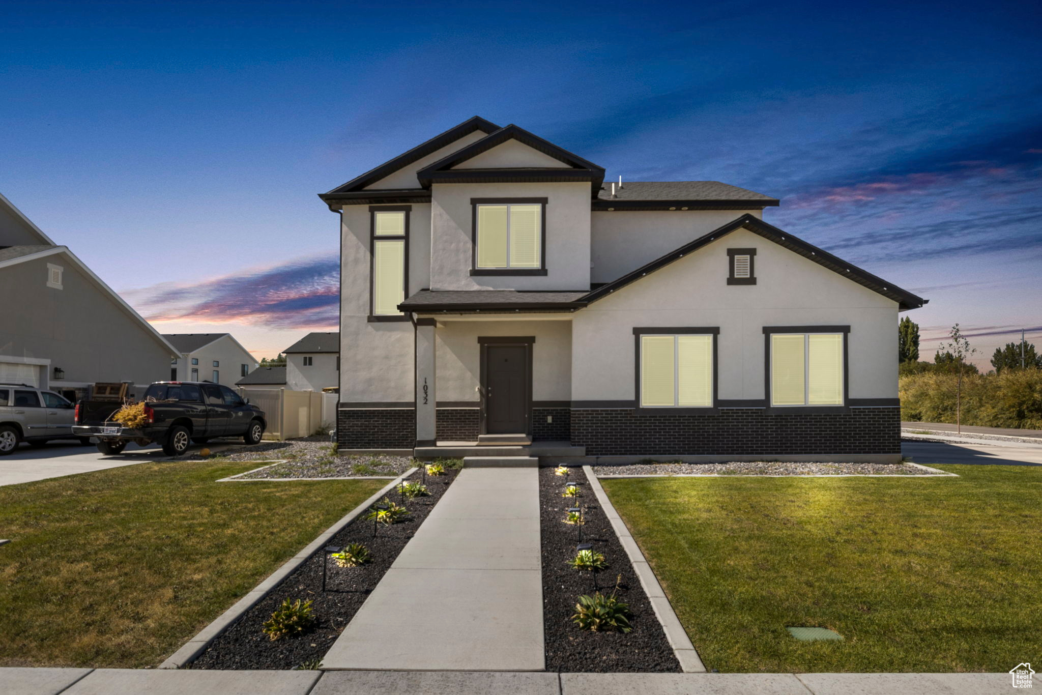 View of front of house with a lawn