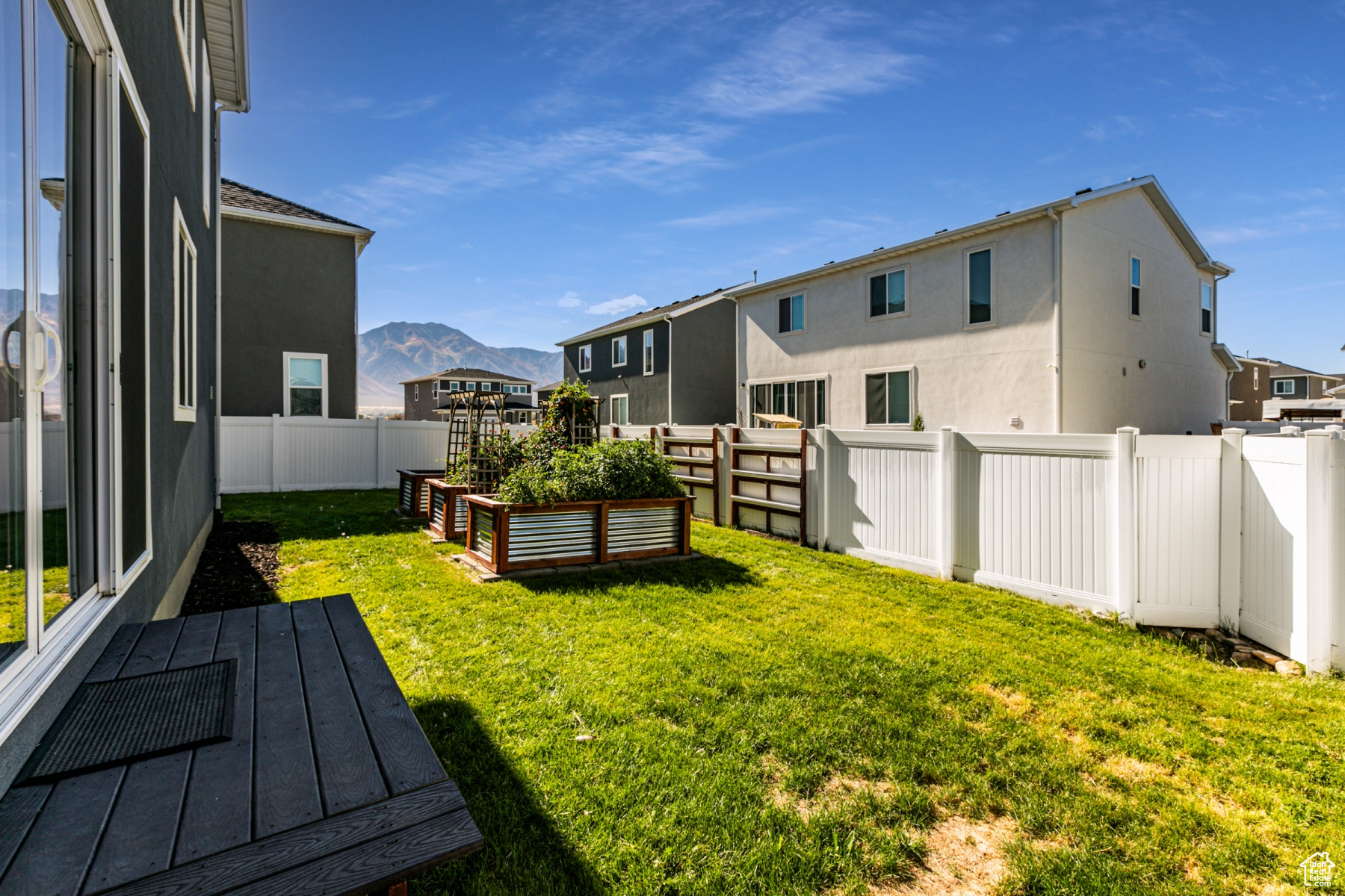 View of yard with a mountain view