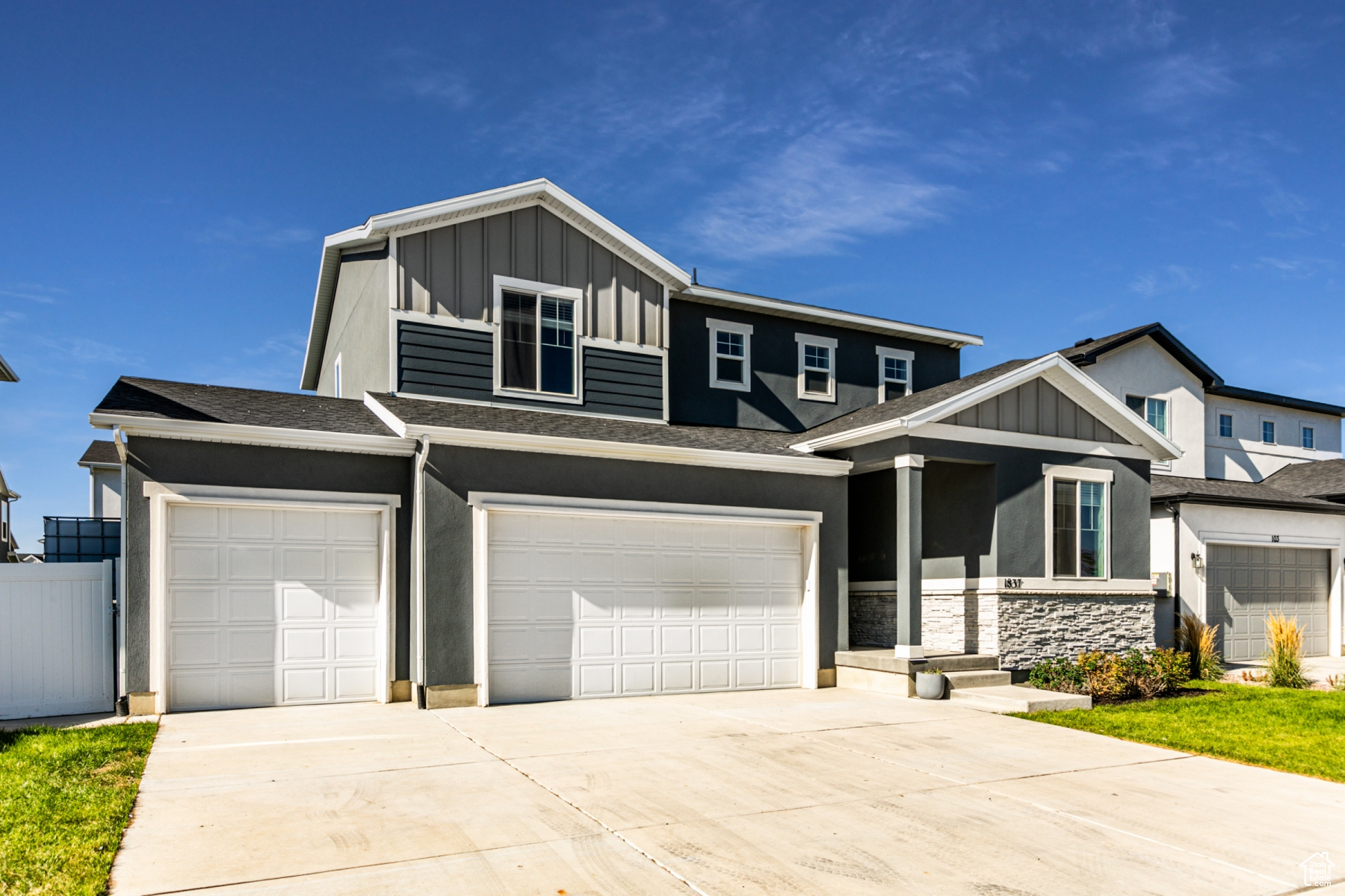 View of front of property with a garage