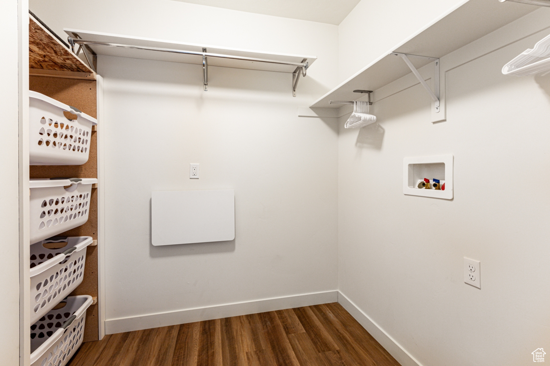 Washroom featuring hookup for a washing machine and dark hardwood / wood-style floors