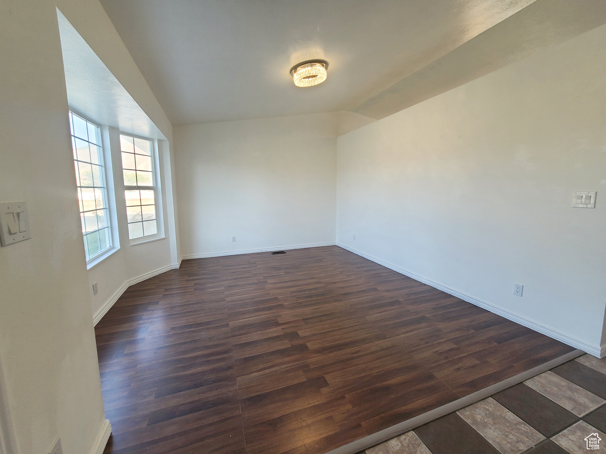 Light filled living room with bay window