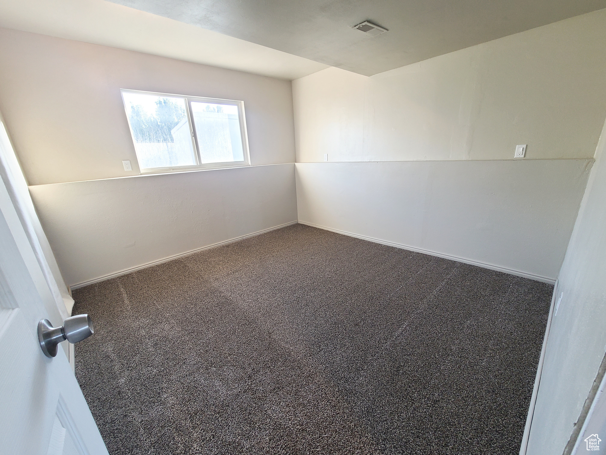 Great fourth bedroom or private office / flex room off the lower level family room