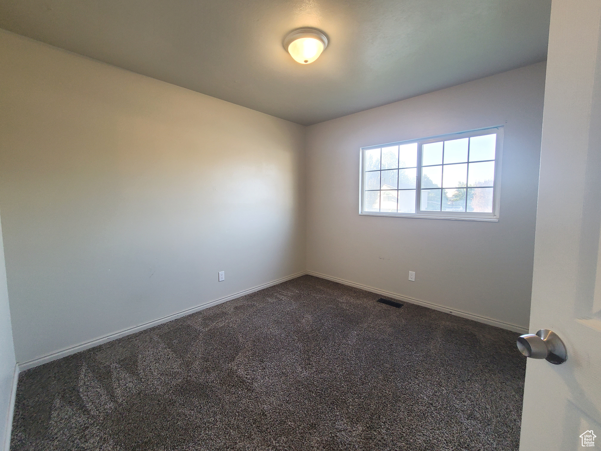 One of three generously sized upper level bedrooms