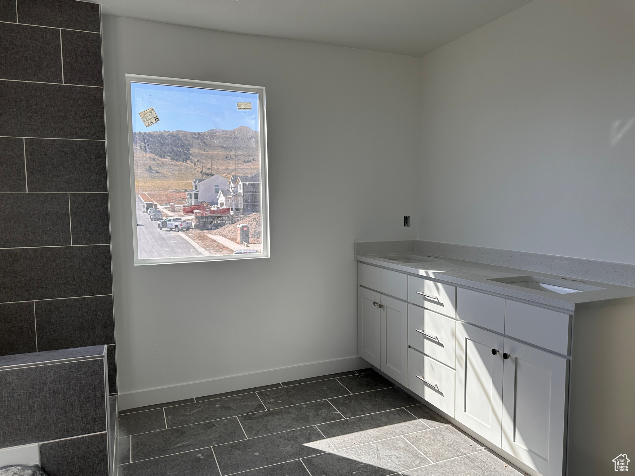 Bathroom featuring vanity and a mountain view