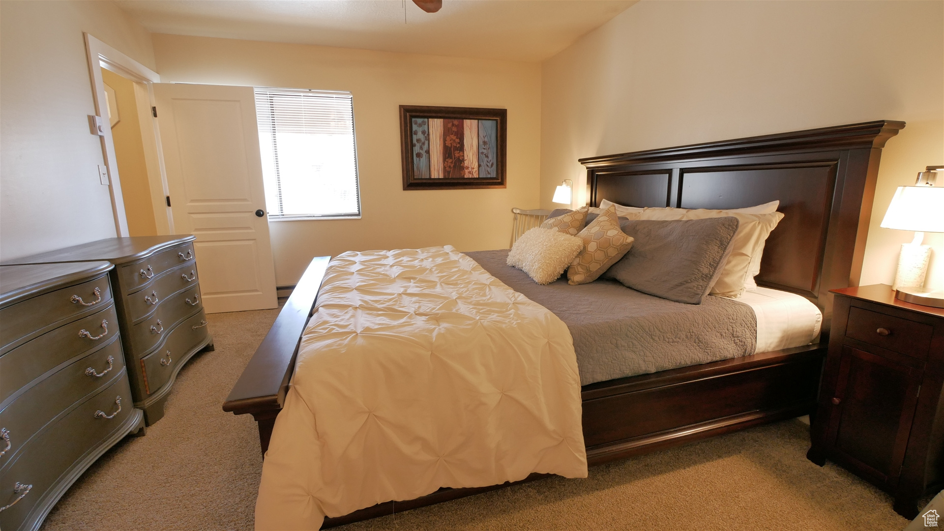 Primary Bedroom featuring carpet flooring and ceiling fan