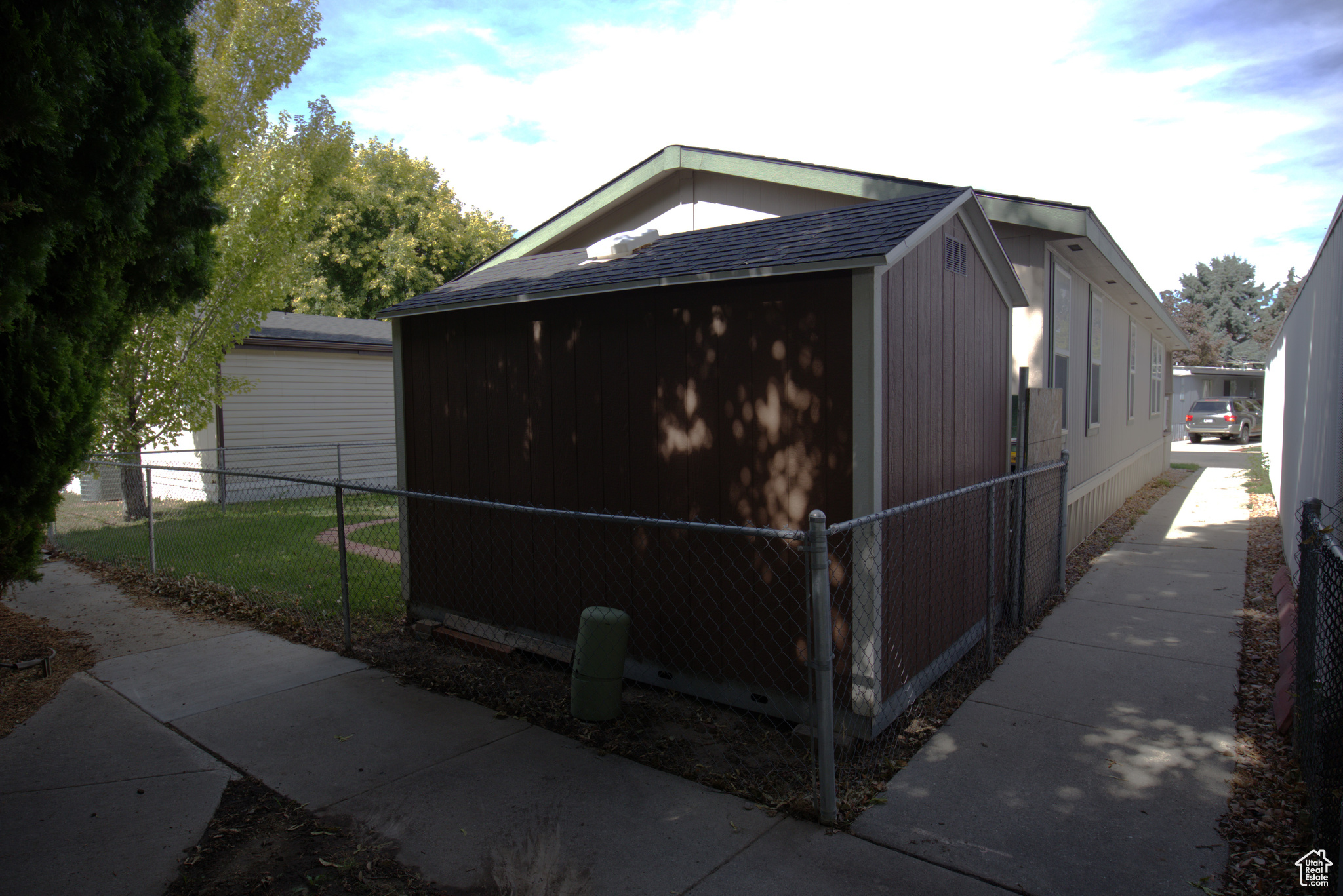 From rear with storage shed