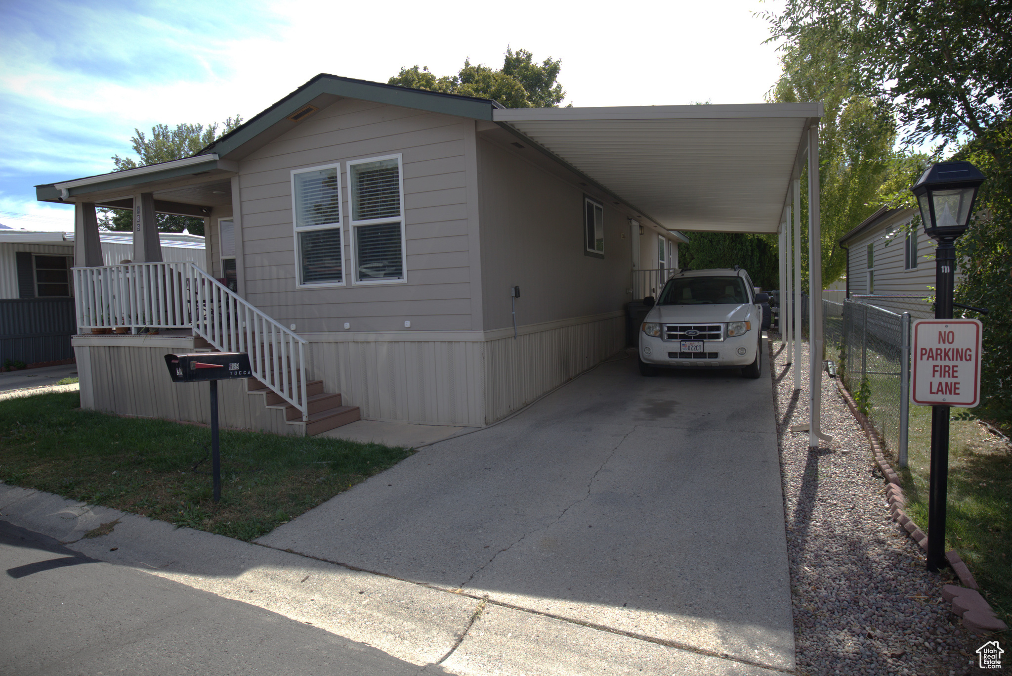 Front View with covered car port