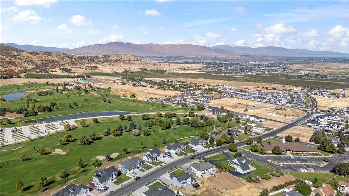 Bird's eye view featuring a water and mountain view