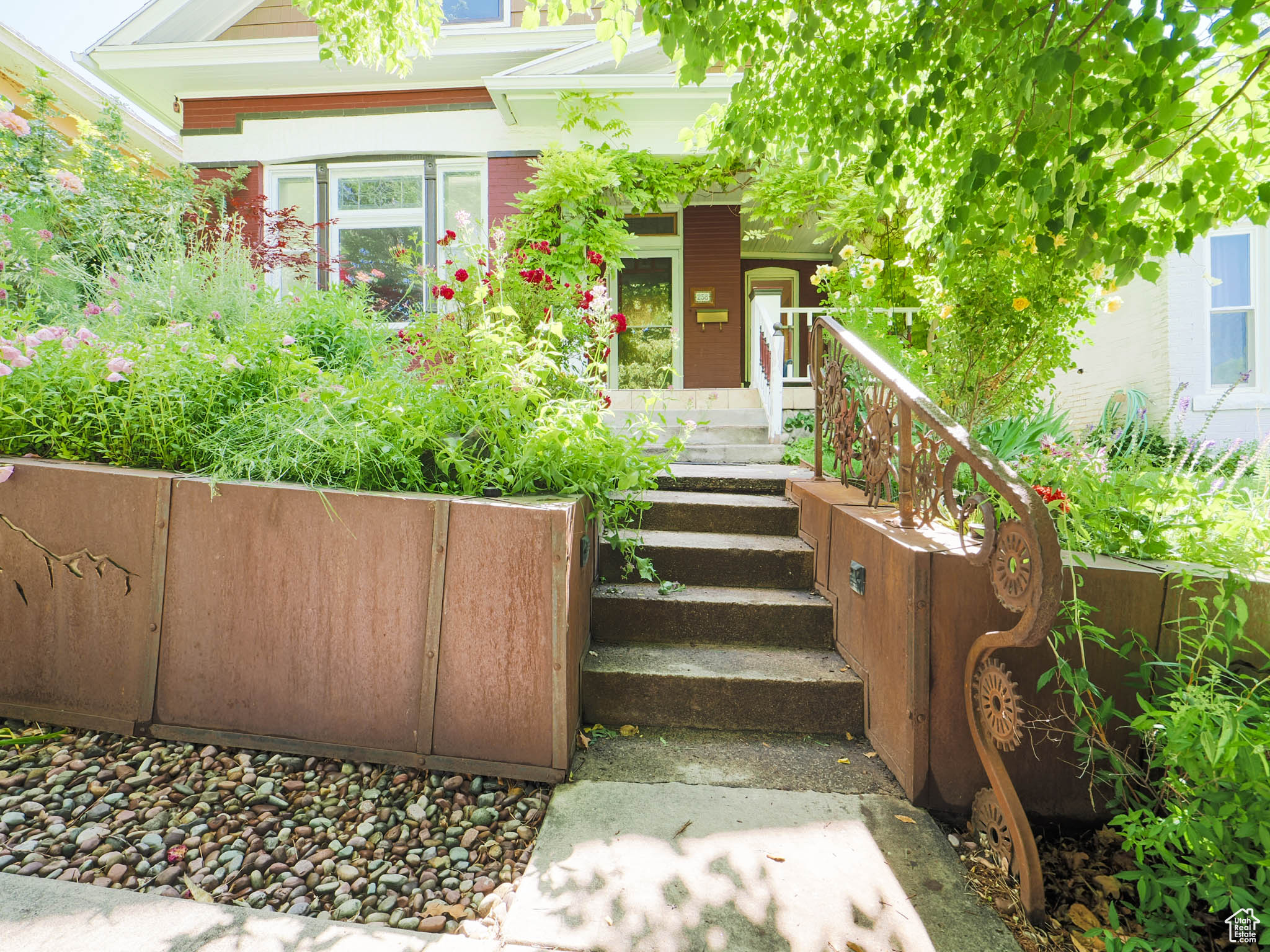 View of exterior entry with covered porch