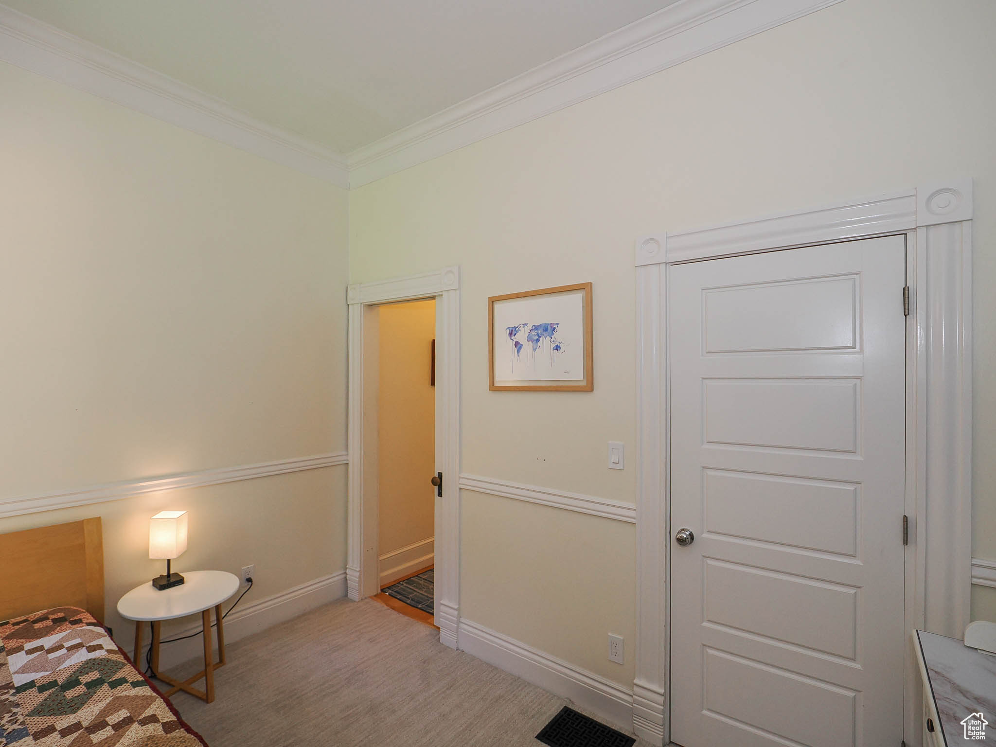 Bedroom featuring crown molding