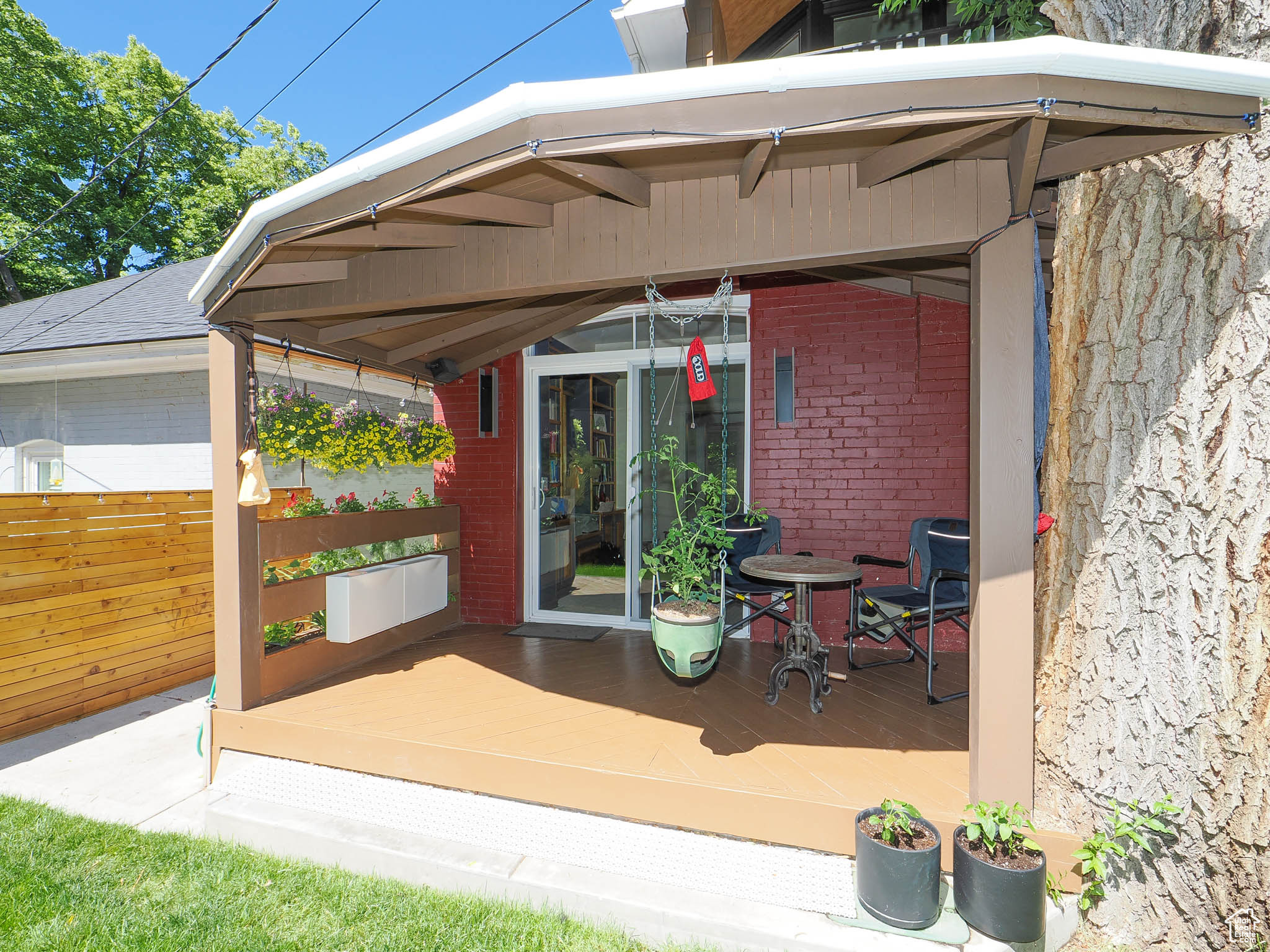 View of patio featuring a wooden deck