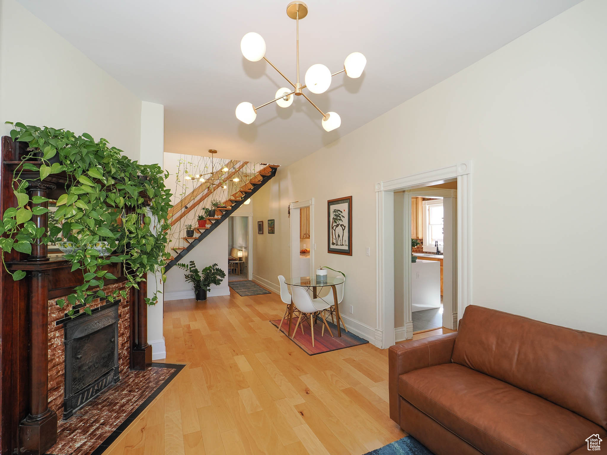 Interior space featuring a notable chandelier and wood-type flooring