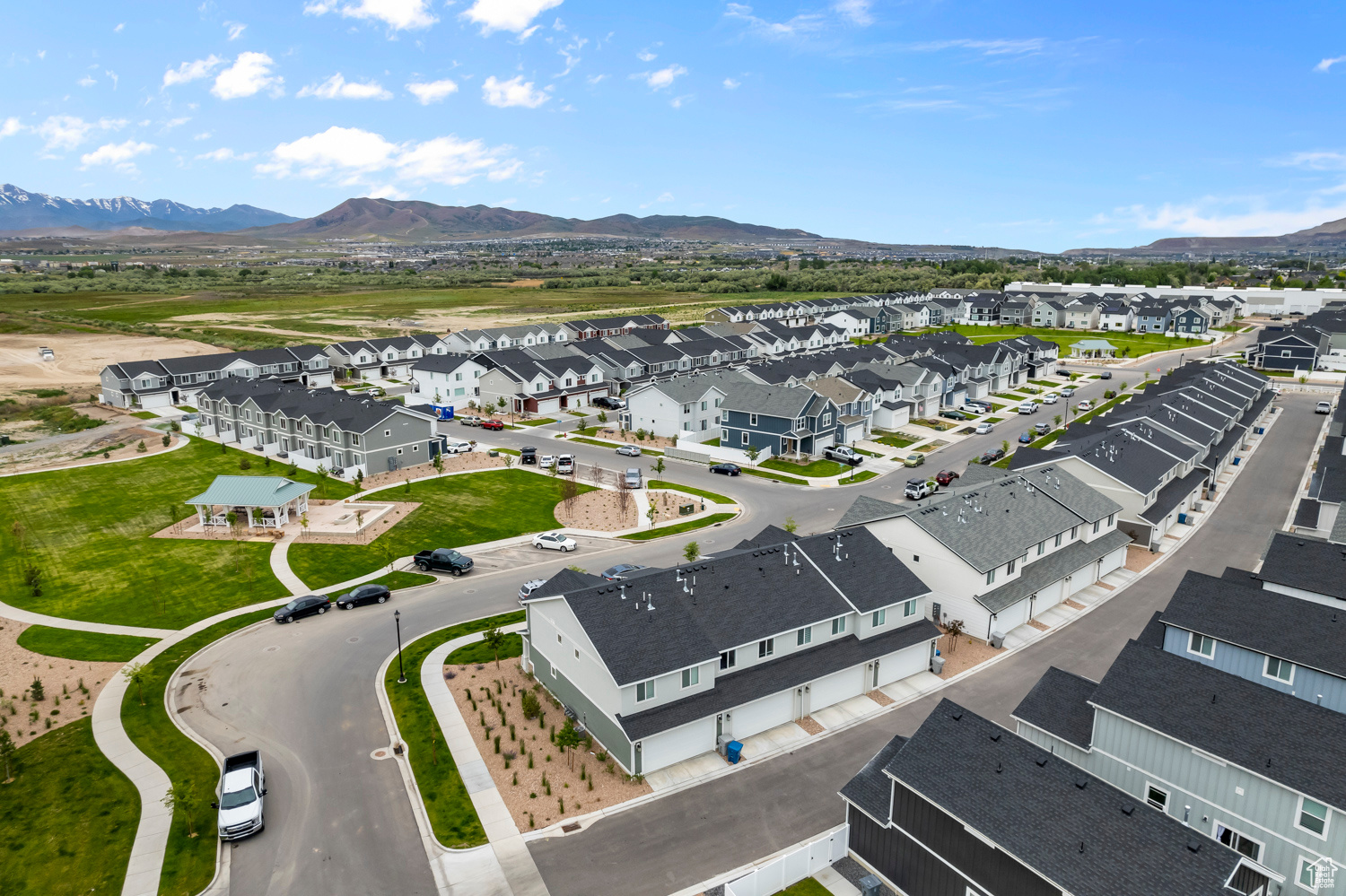 Birds eye view of property with a mountain view