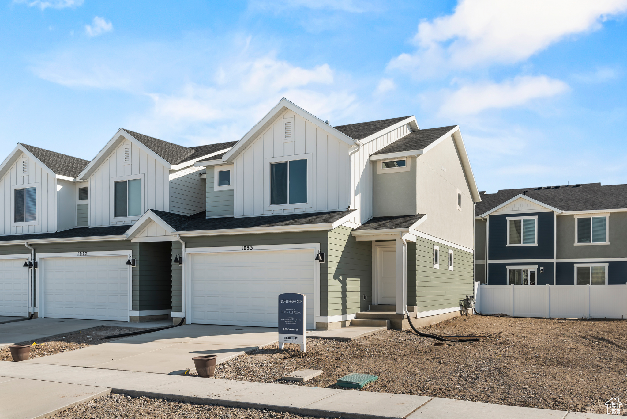 View of front of home featuring a garage