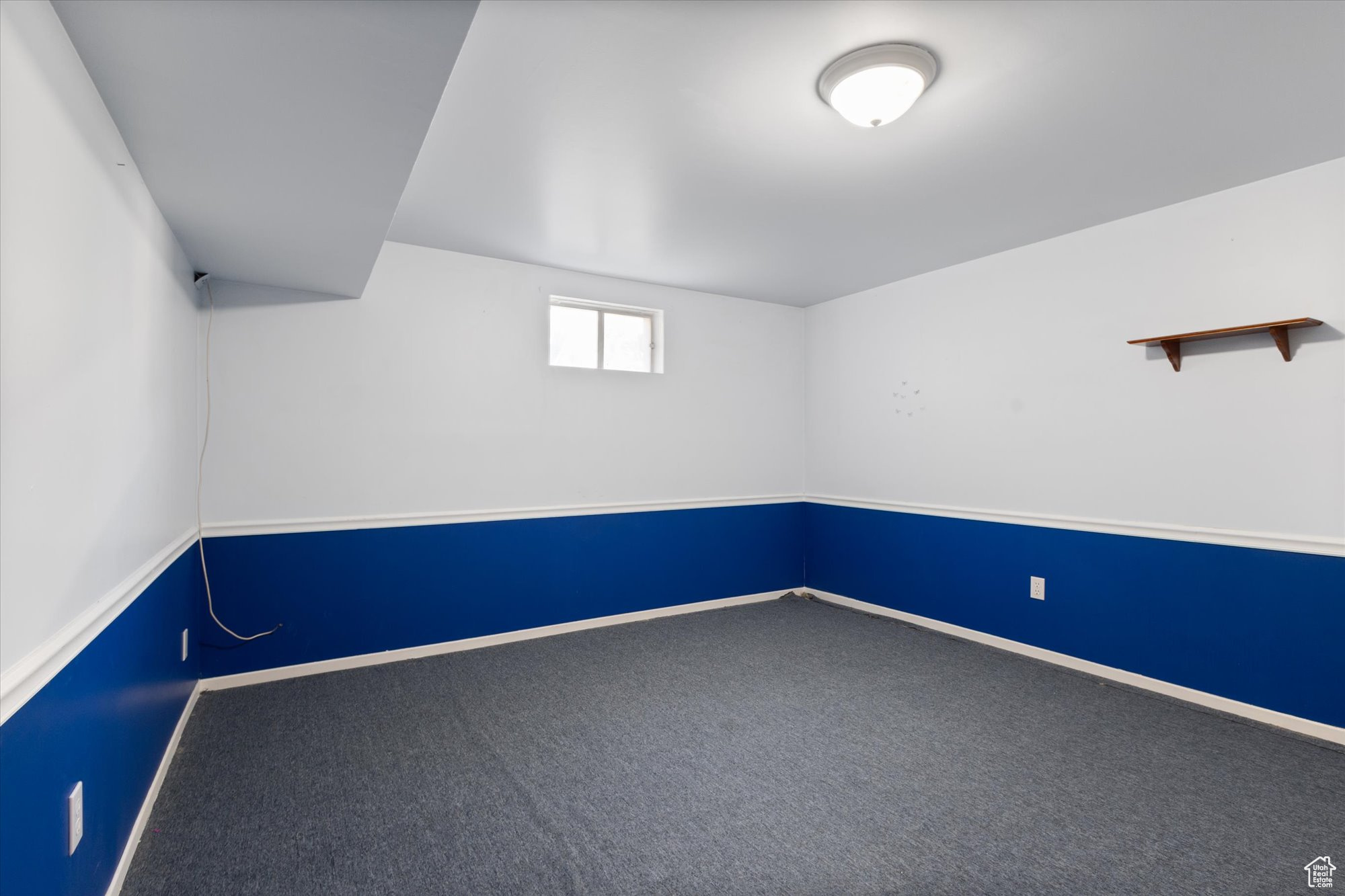 Spare room with carpet floors