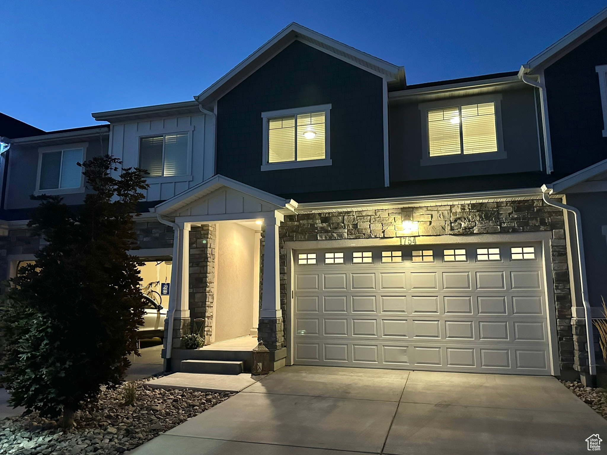 View of front of home featuring a garage