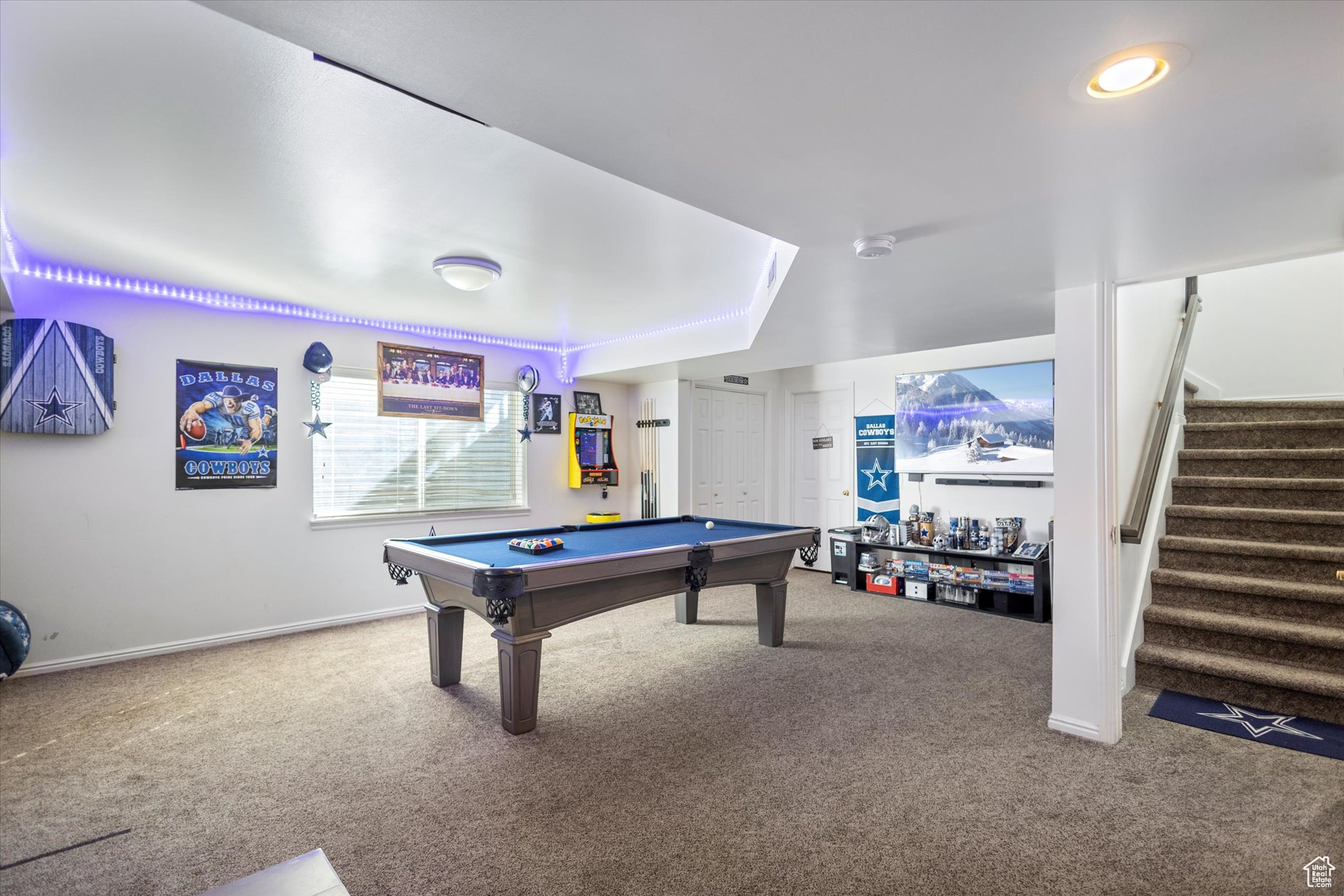 Playroom with carpet floors and billiards