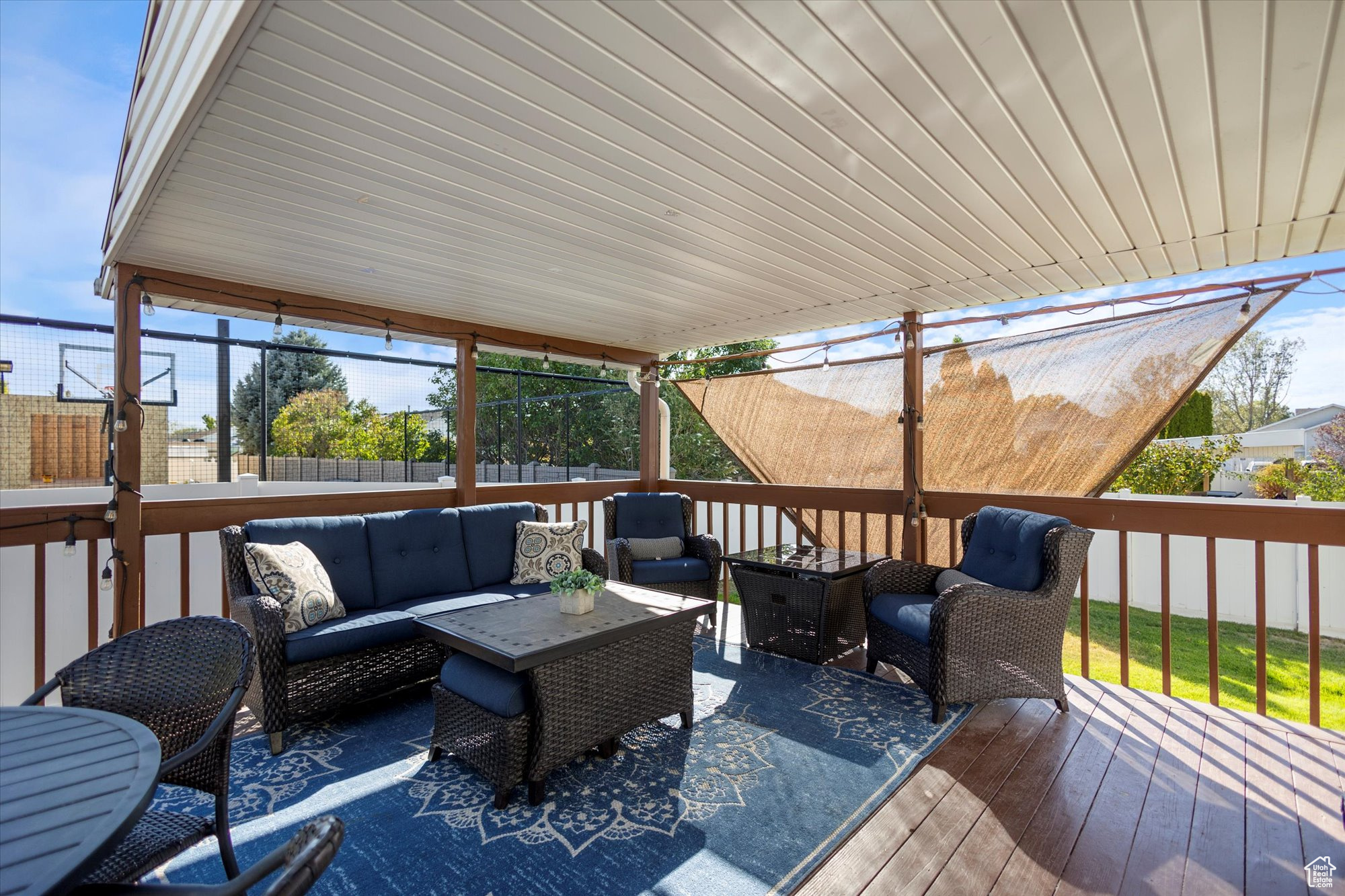 Wooden deck with an outdoor living space