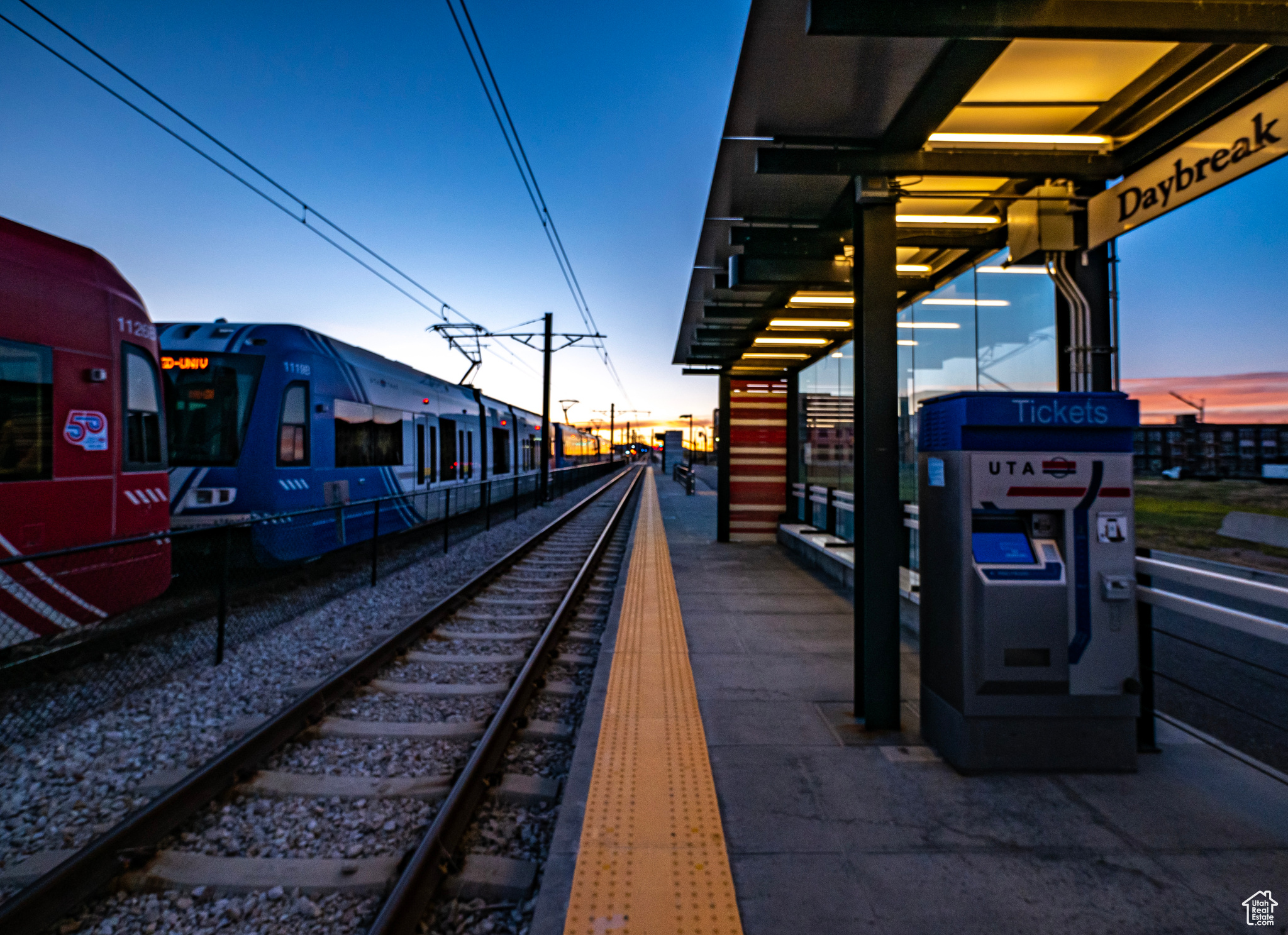 Daybreak has 2 Trax stations on the Red Line with another to be added. This connects through downtown Salt Lake City up to the U of U Campus.