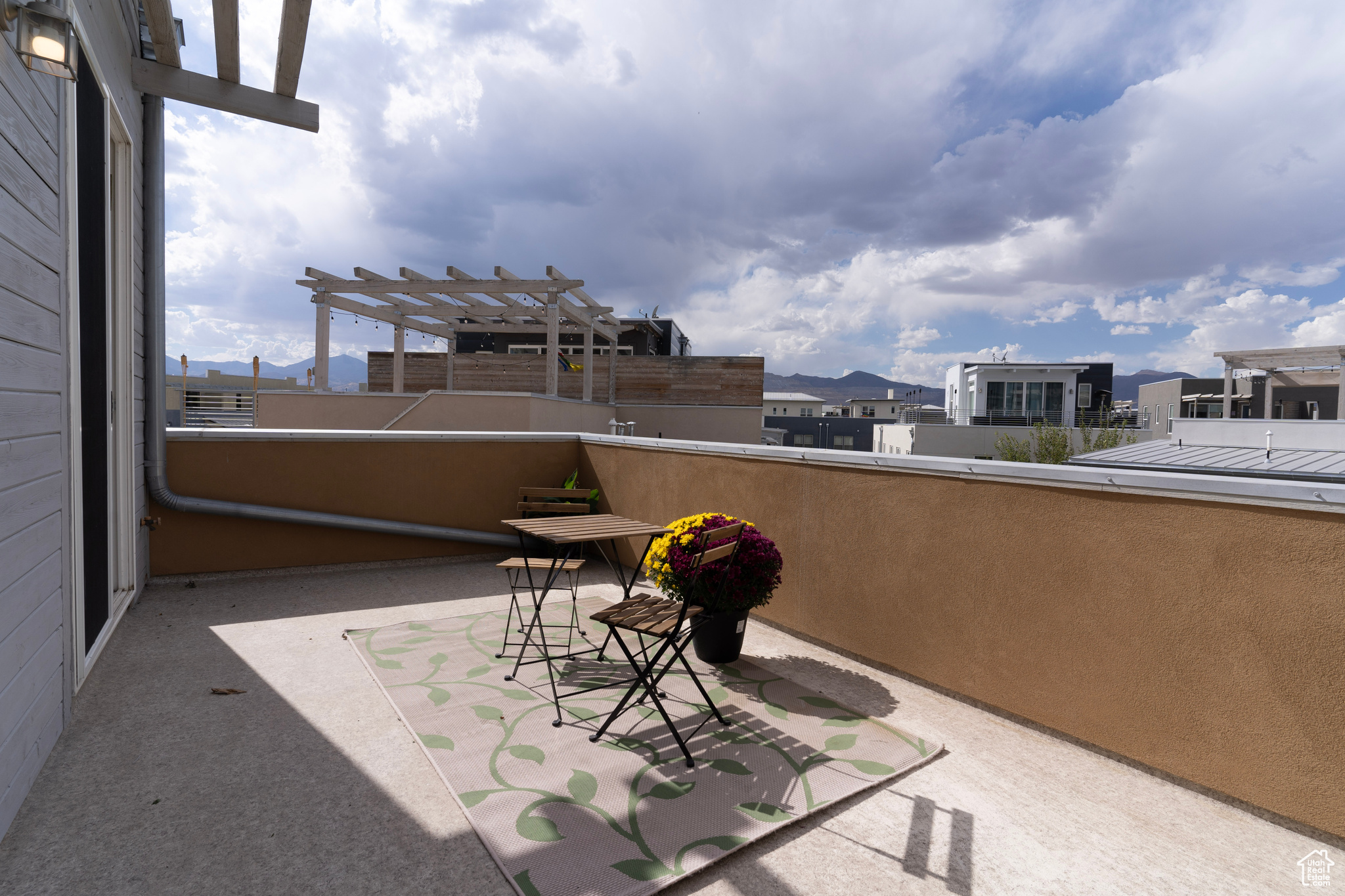 Enjoy stunning town views with the Oquirrh Mountains as a backdrop from the deck that offers of plenty of afternoon sun and breathtaking sunsets.