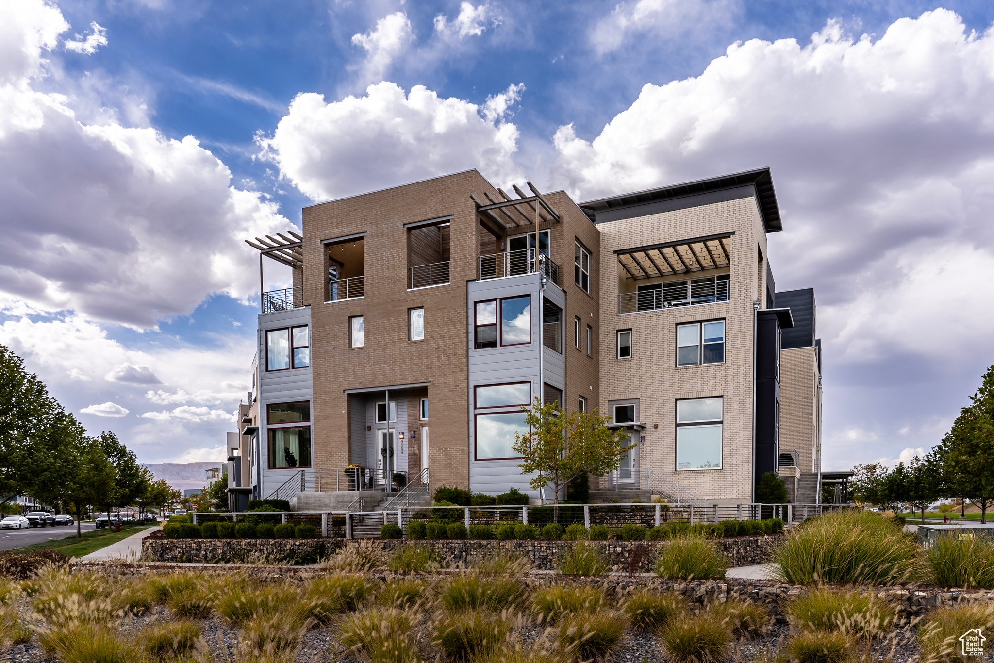 These uniquely planned castle-like townhomes are built by Sego, who is known for innovative roof decks and for maximizing homeowners’ quality of life by strategically minimizing sharing walls and staggering decks for maximum views.