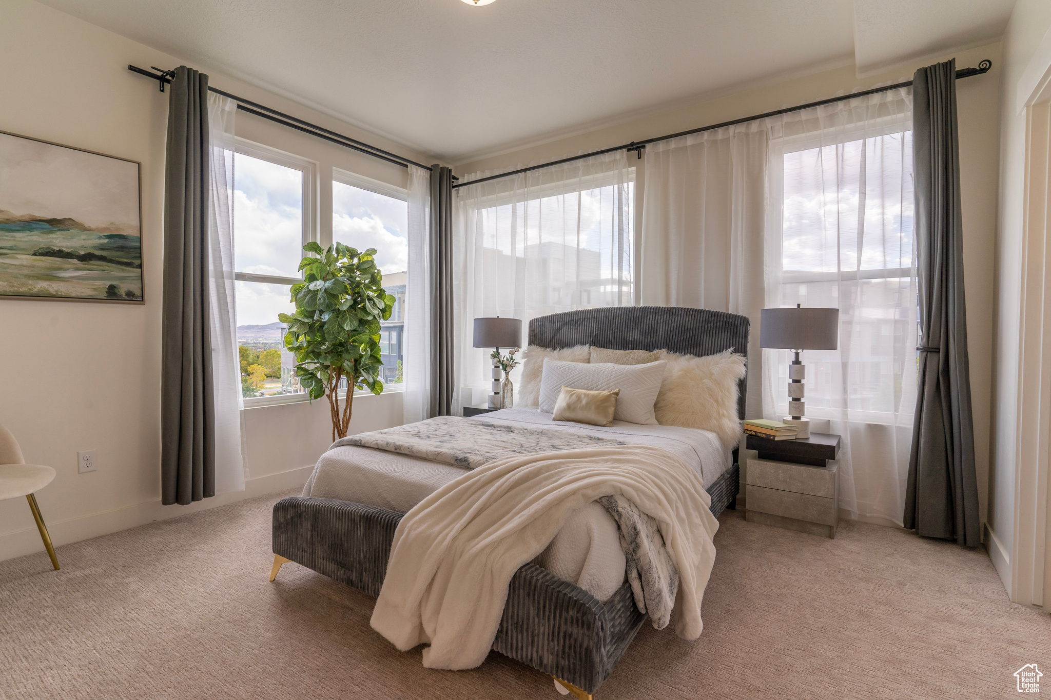 Forget the corner office and upgrade to this corner Primary bedroom where mountains, clouds and rainbows are your neighbors and the sunrise is your alarm clock. Natural light streams in at your discretion with many options for curtain configurations.