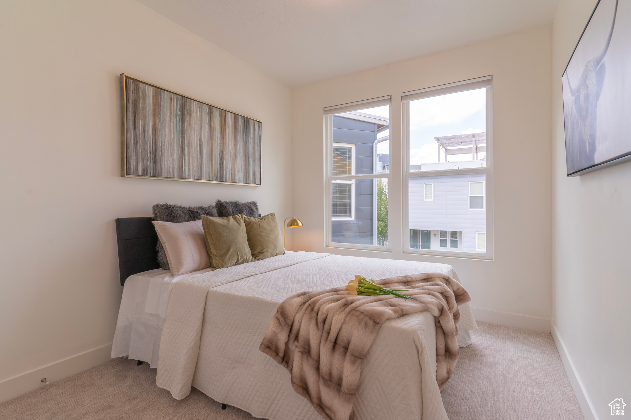 The quaint secondary bedrooms are an entire hallway away from the Primary Bedroom with the laundry room and secondary bathroom between to offer ultimate privacy.