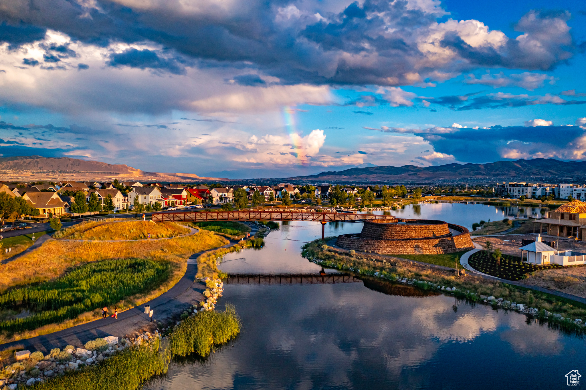 Just across the foot bridge is a whole world of various villages, each with its own vibe. Each connected by trails, minutes from parks, play areas, pools, and water sports.