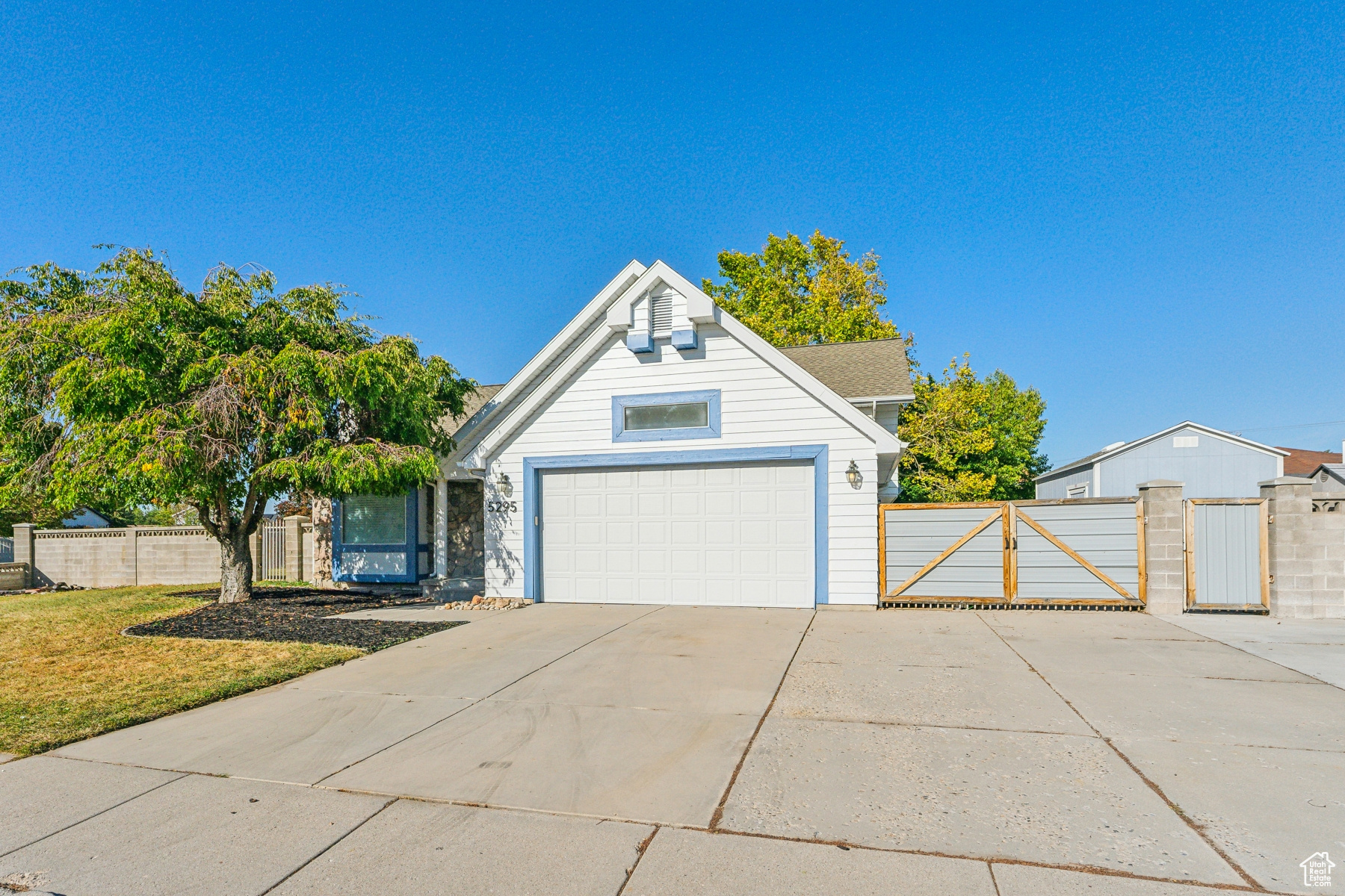 View of front of property featuring a garage