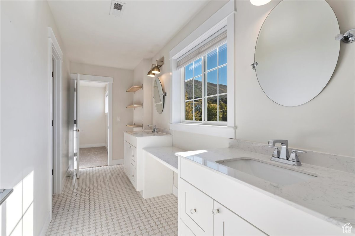 Bathroom featuring vanity