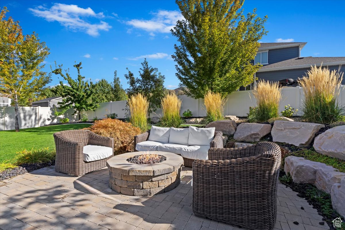 View of patio / terrace featuring a fire pit