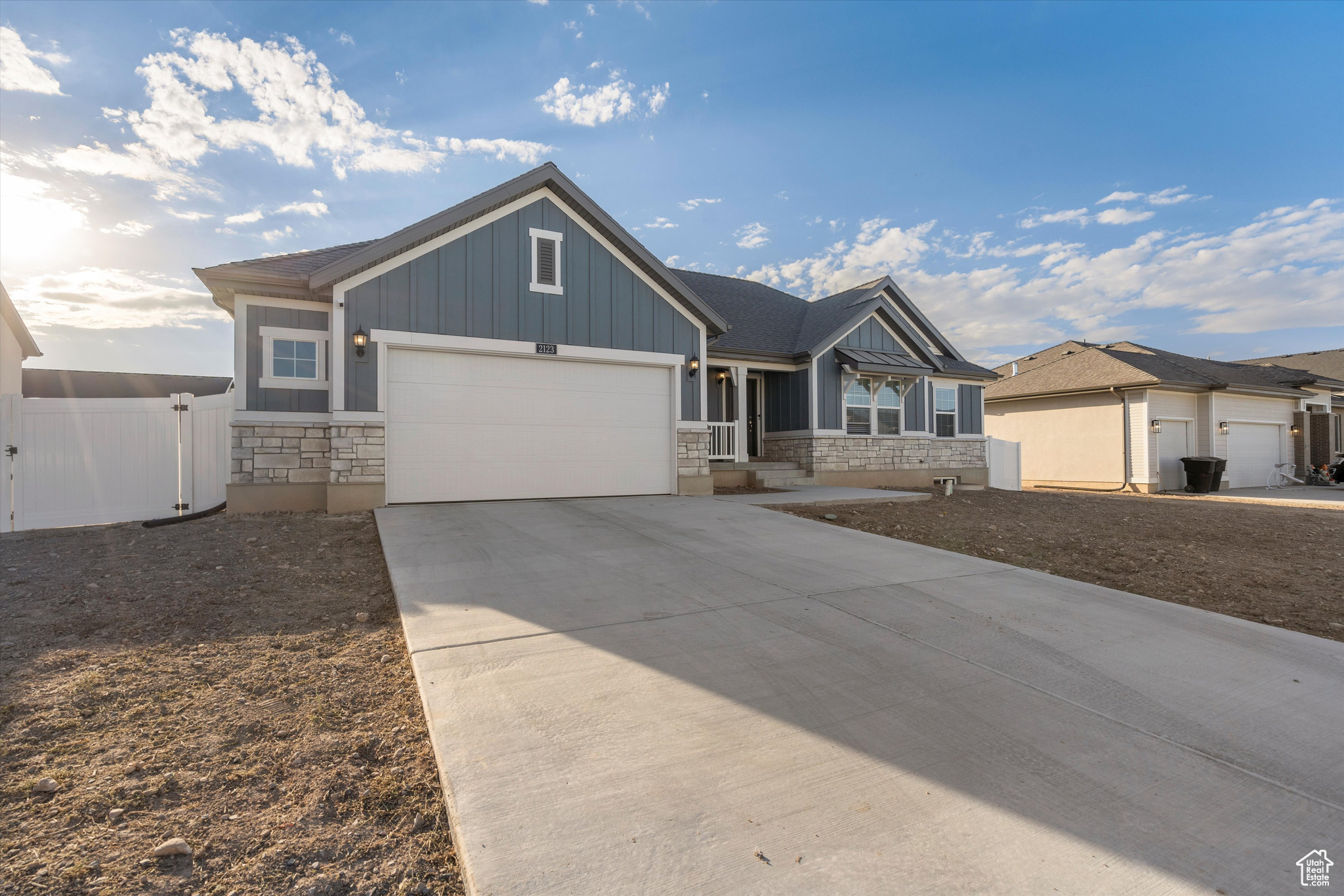 View of front of property featuring a garage